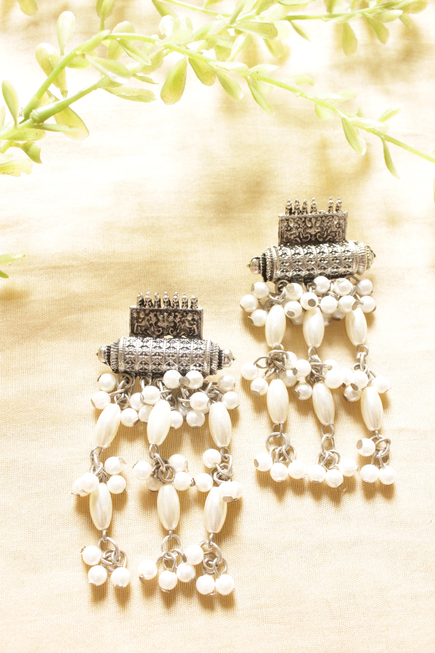 White Beads String Oxidised Finish Elaborate Dangler Earrings