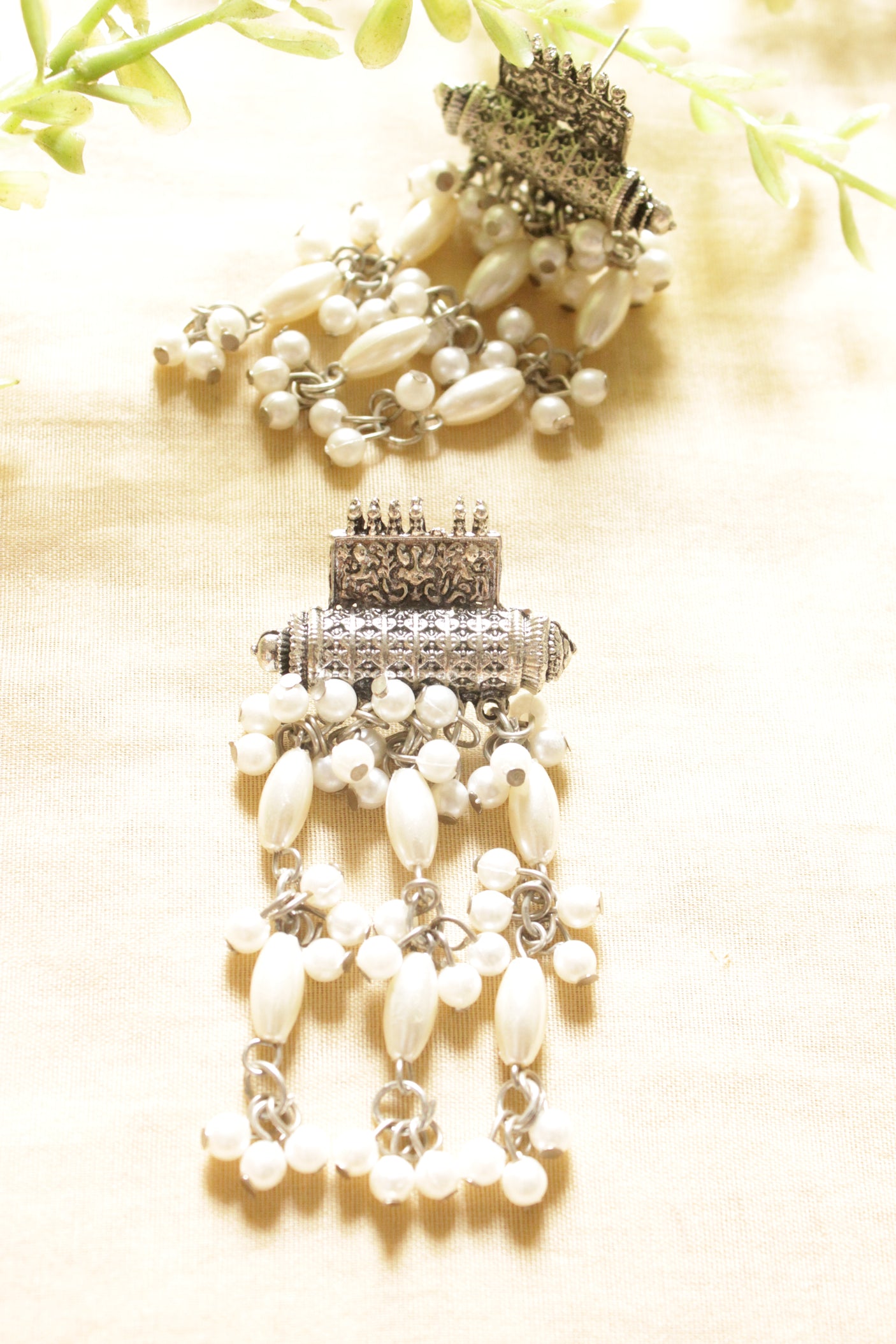 White Beads String Oxidised Finish Elaborate Dangler Earrings