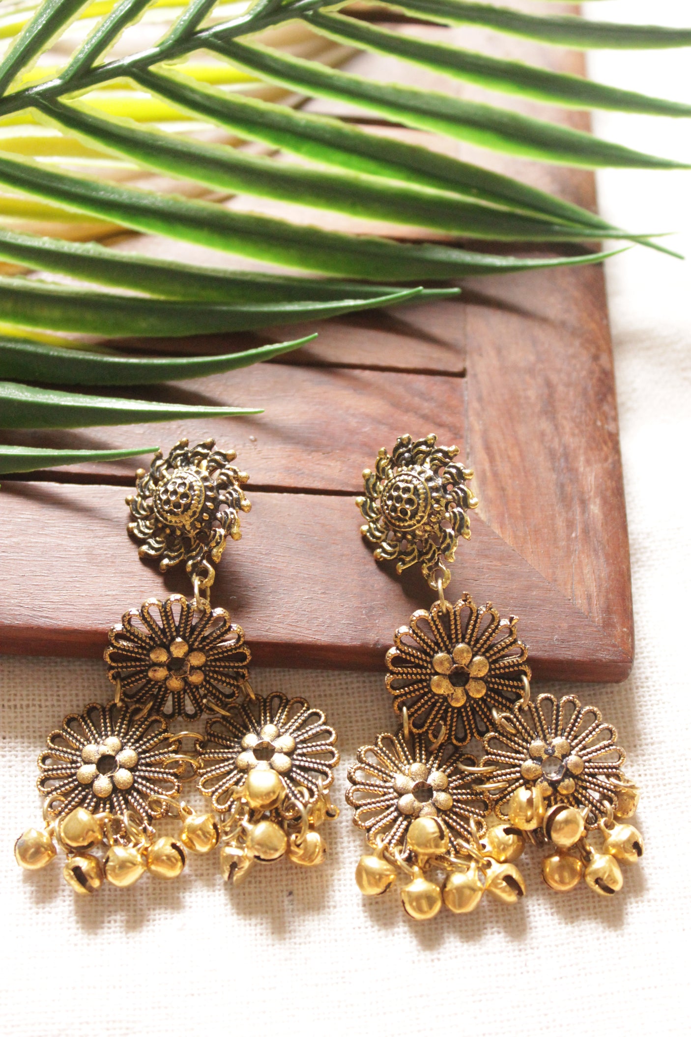 Purple Braided Threads Necklace Set Embellished with Antique Gold Finish Flower Motifs Metal Charms