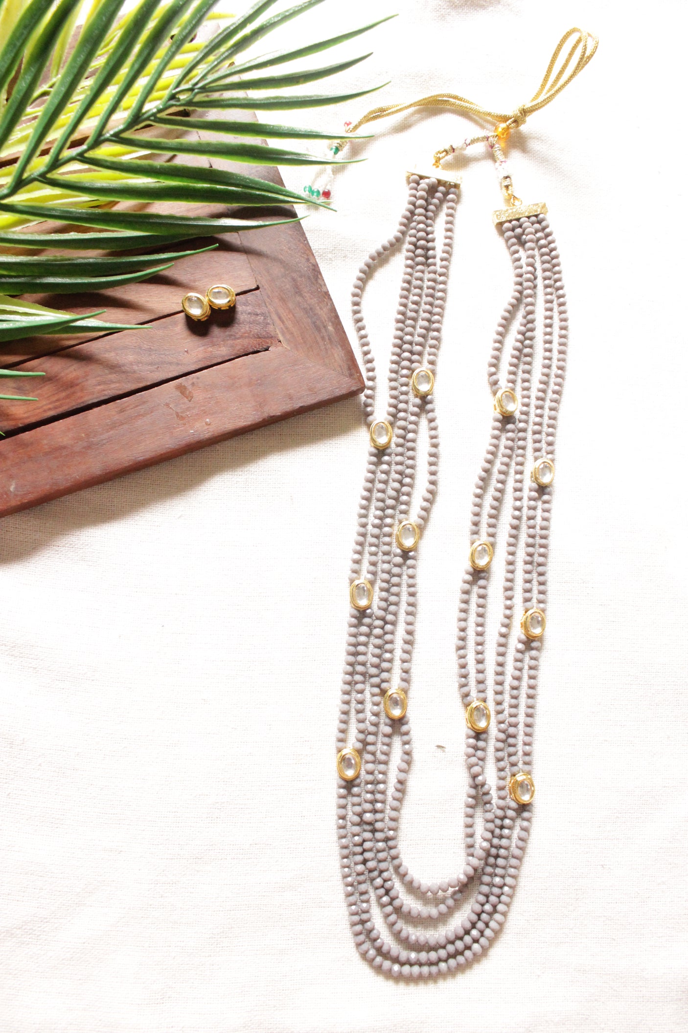 5 Layered Grey Crystal Beads Necklace Set Embellished with Kundan Stones