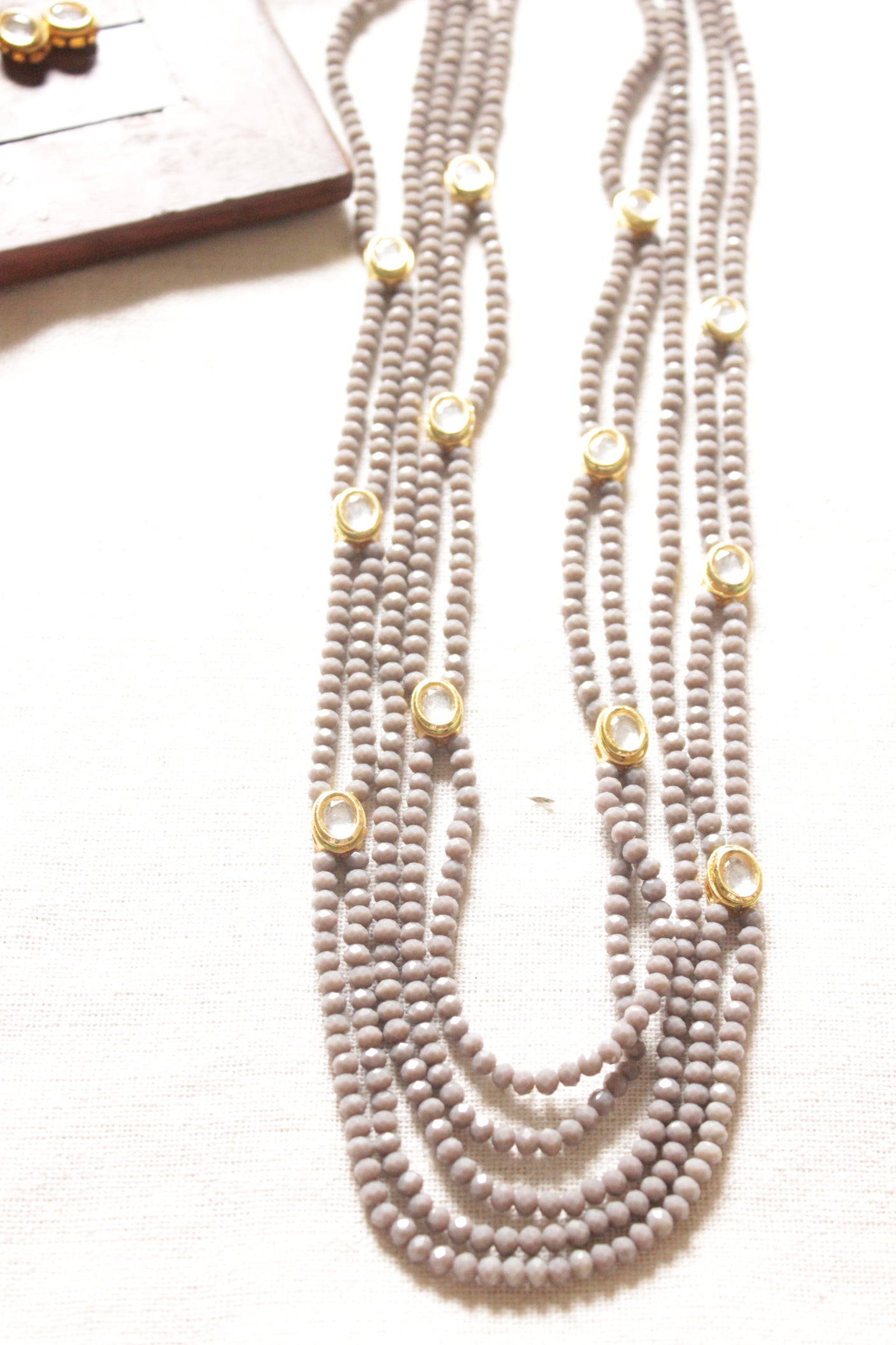 5 Layered Grey Crystal Beads Necklace Set Embellished with Kundan Stones