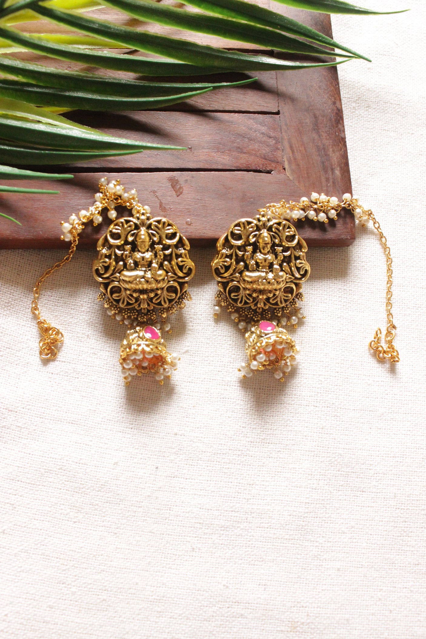 Religious Motifs Dull Gold Finish Temple Jewelry Jhumka Earrings with Ear Chain