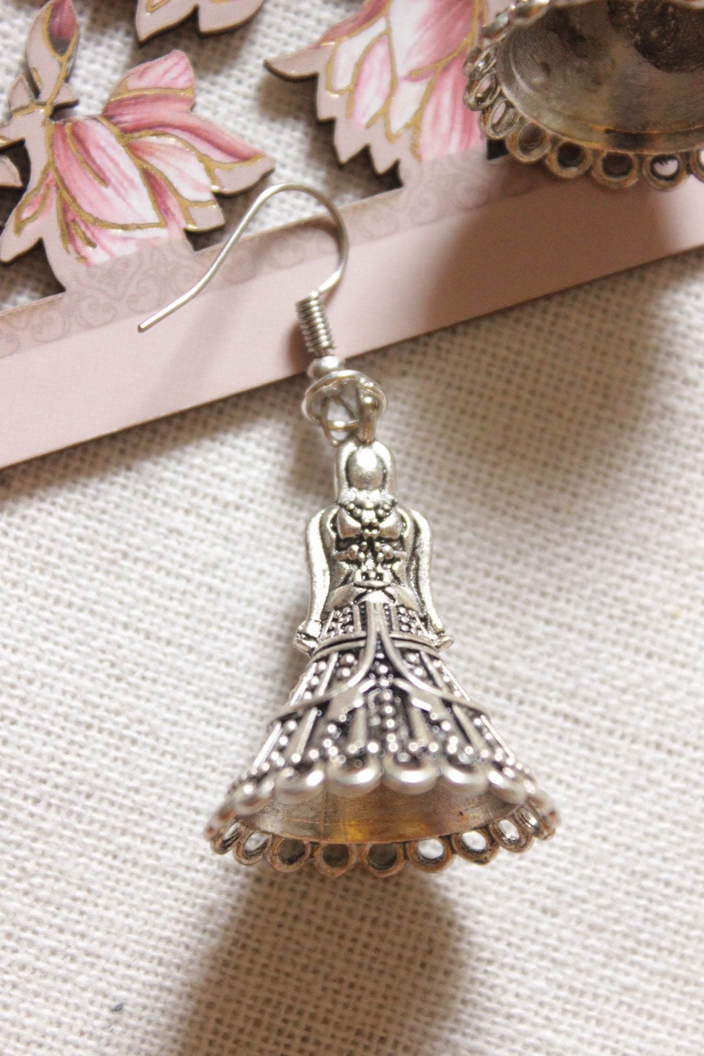 Woman in Tradition Indian Attire Oxidised Finish Metal Earrings