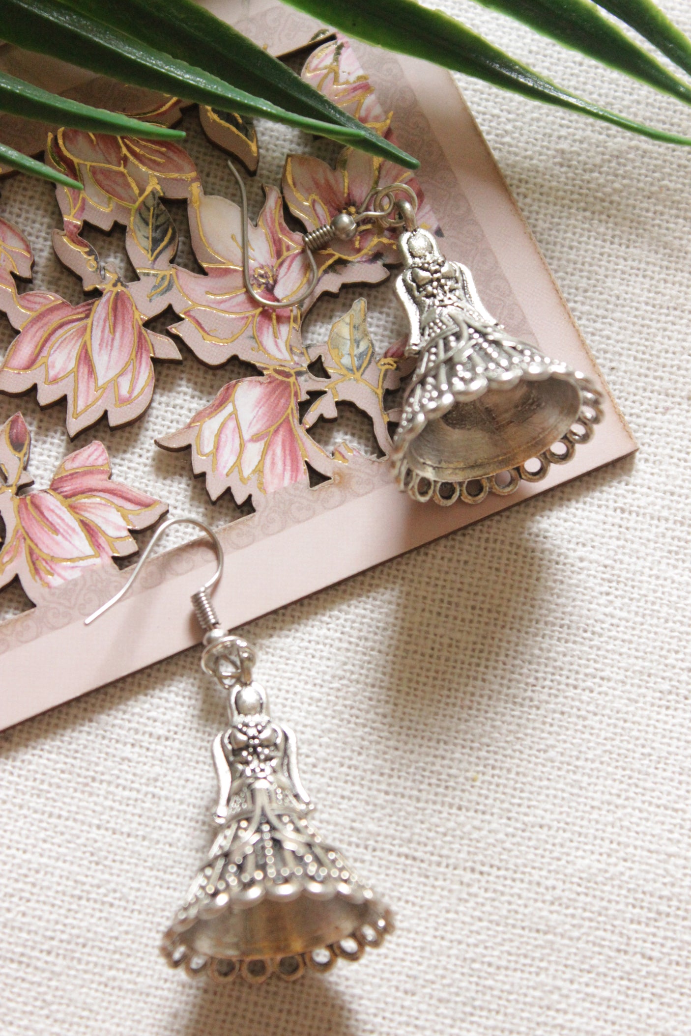 Woman in Tradition Indian Attire Oxidised Finish Metal Earrings