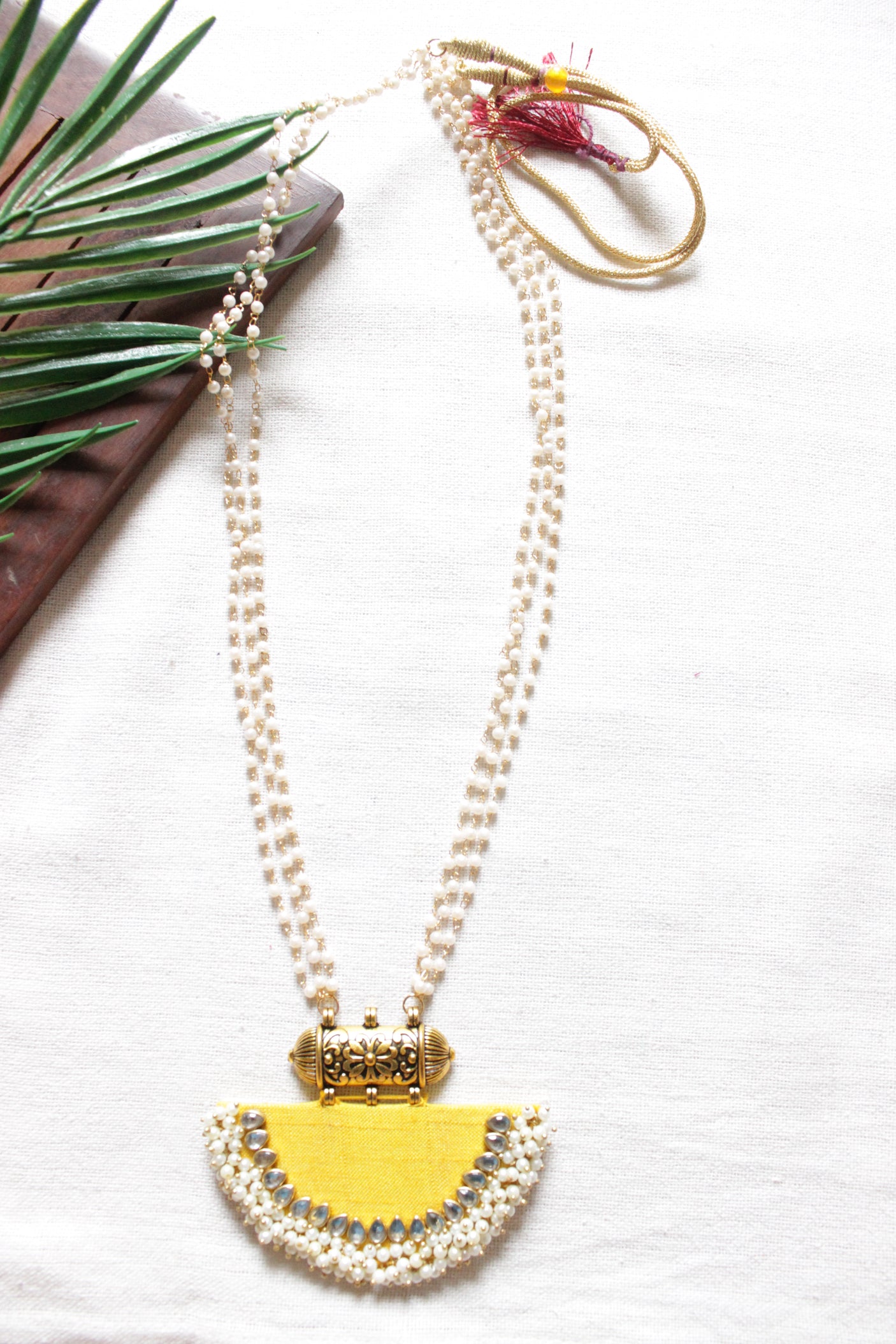 Vibrant Yellow Fabric Kundan Stones and White Pearl Beads Necklace