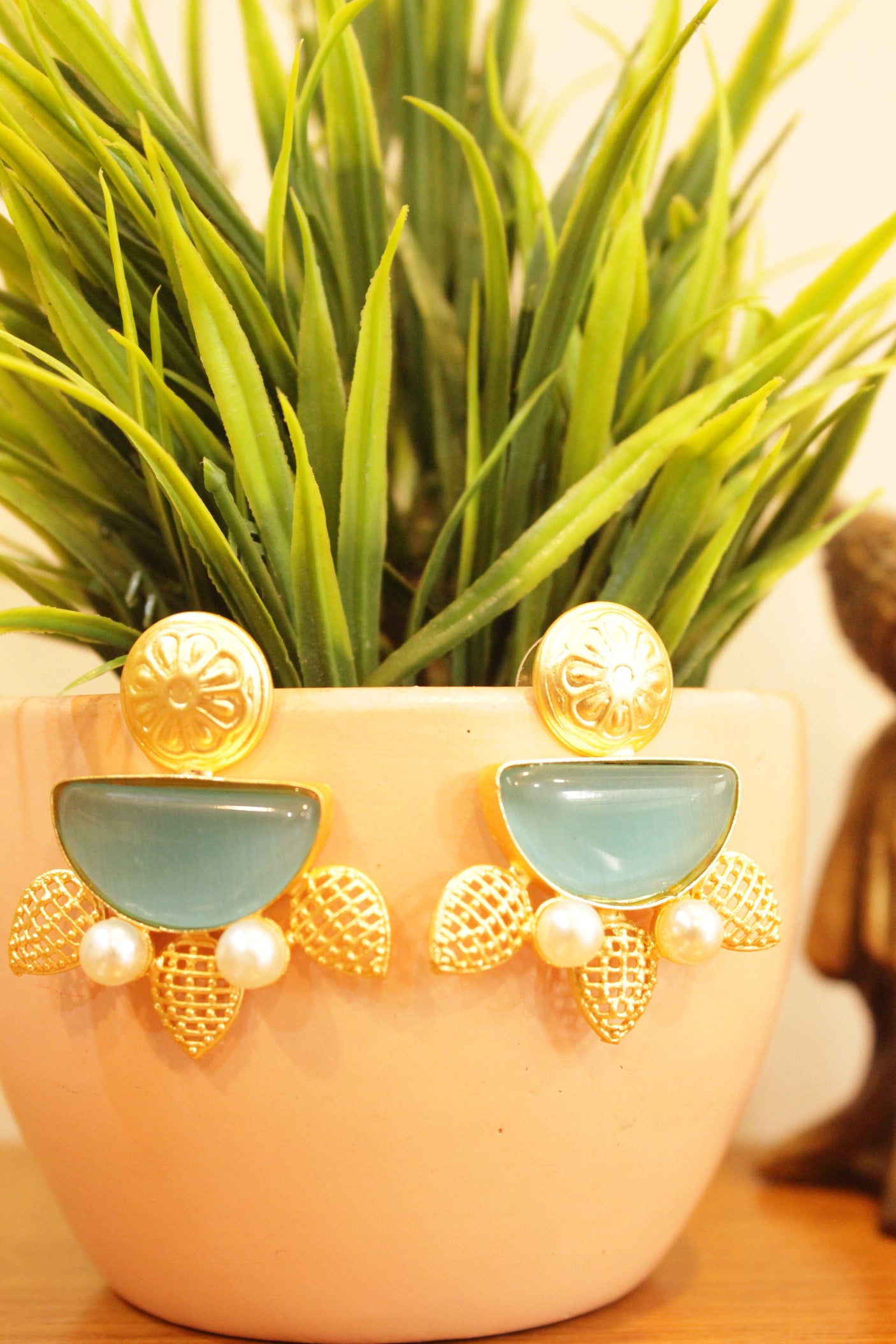 Sky Blue Natural Gemstones Embedded Gold Finish Earrings