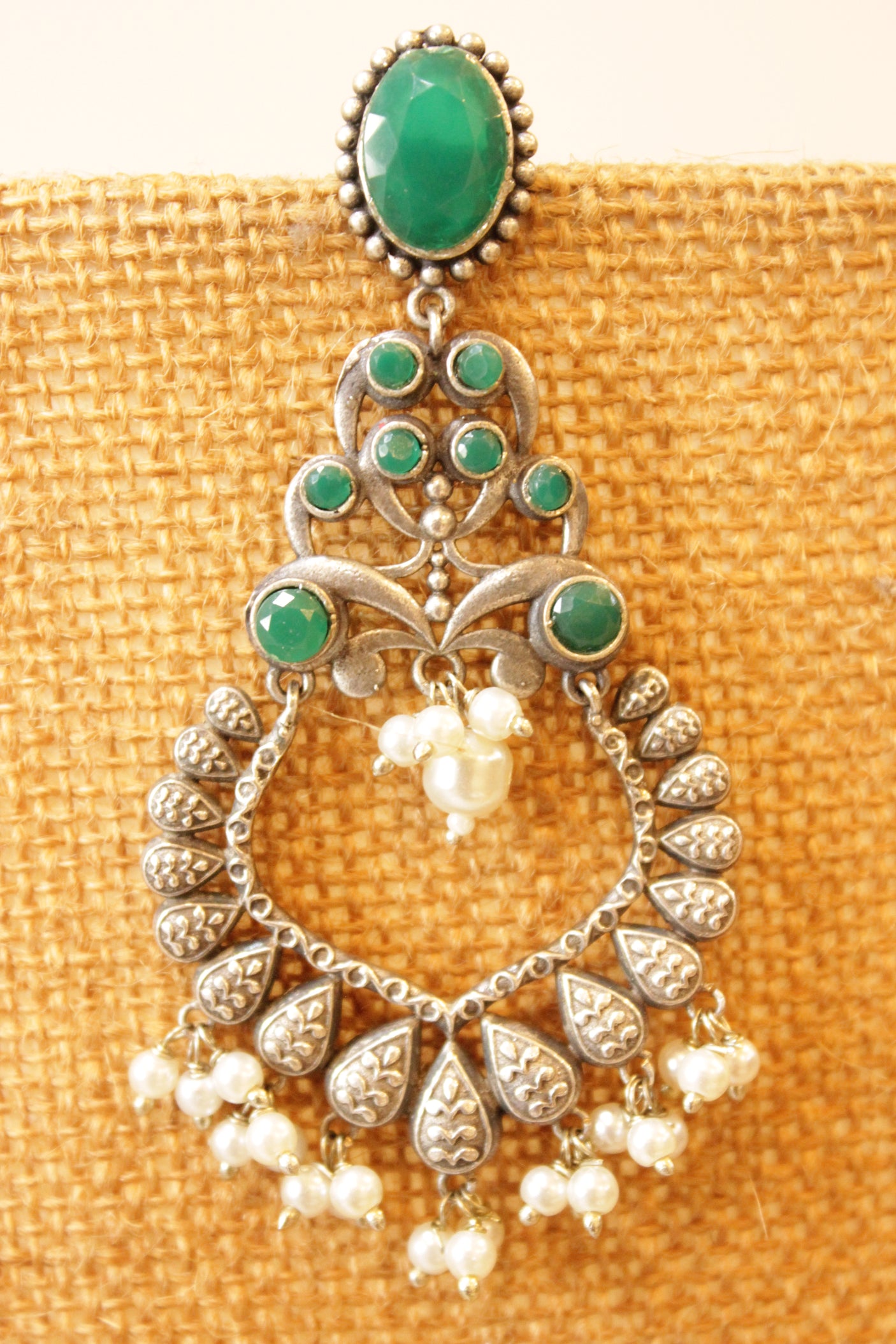 Green Glass Stones Embedded Oxidised Finish Statement Earrings Accentuated with White Beads