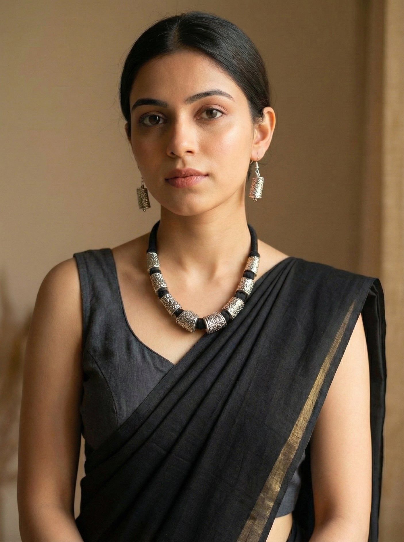 Intricately Detailed Metal Accents Braided with Black Fabric Threads Necklace Set