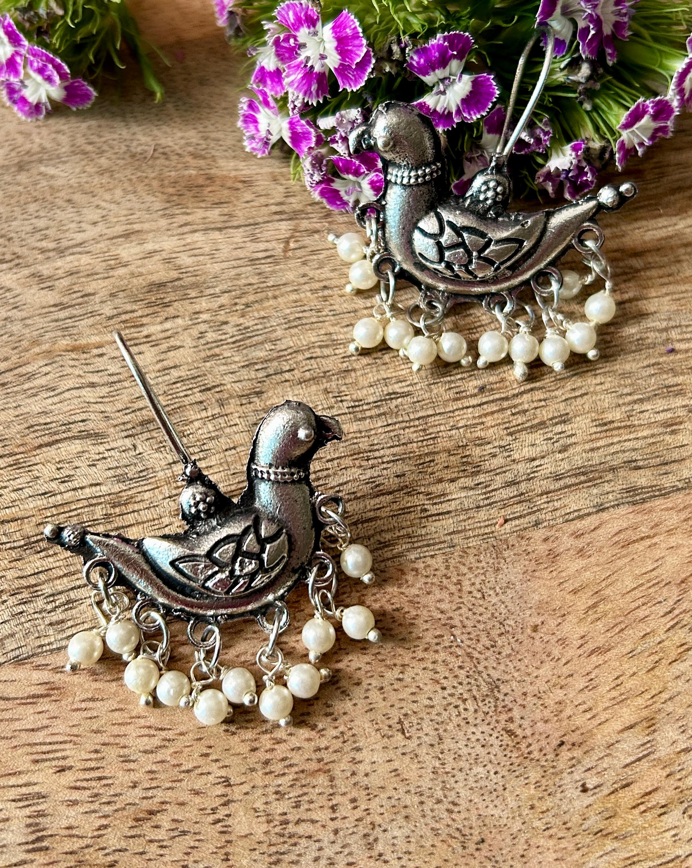 Intricately Crafted Peacock Earrings with White Beads