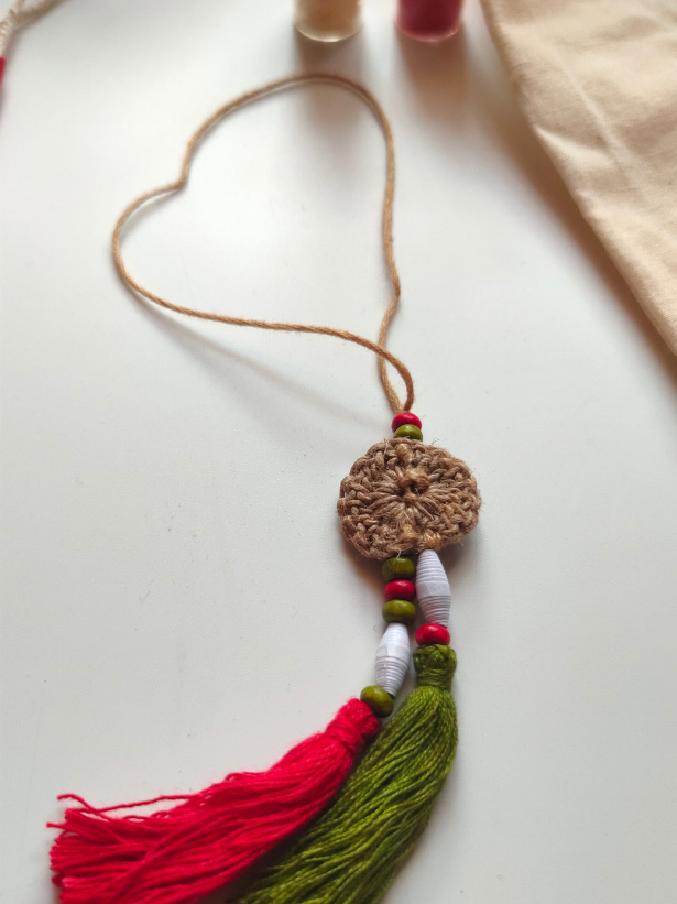 Eco-Friendly Handmade Jute Lumba Rakhi with Dried Leaves and Flower Petals (Comes with a Reusable Cloth Pouch and Recycled Paper Card)
