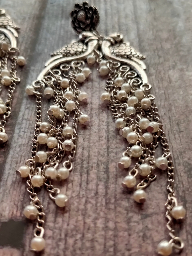 Intricately Crafted Long Peacock Earrings with White Beads