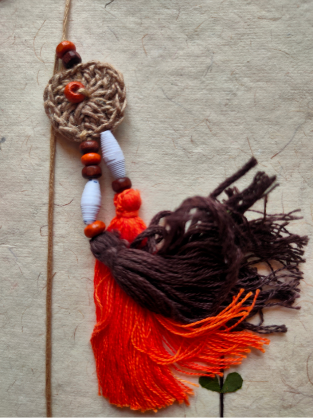 Eco-Friendly Handmade Jute & Thread Lumba Rakhi with Dried Leaves and Flower Petals (Comes with a Reusable Cloth Pouch and Recycled Paper Card)