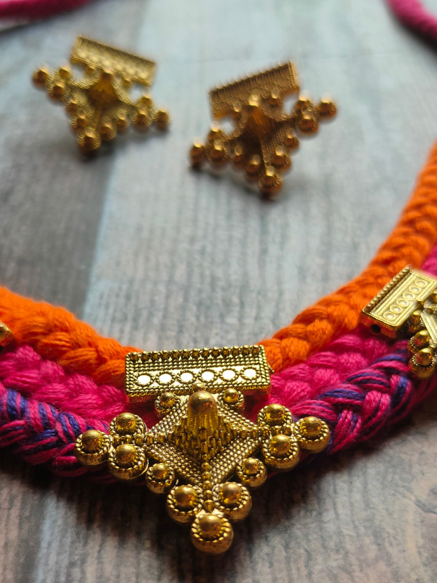 Red & Pink Braided Fabric Threads Necklace Set with Antique Gold Finish Metal Charms