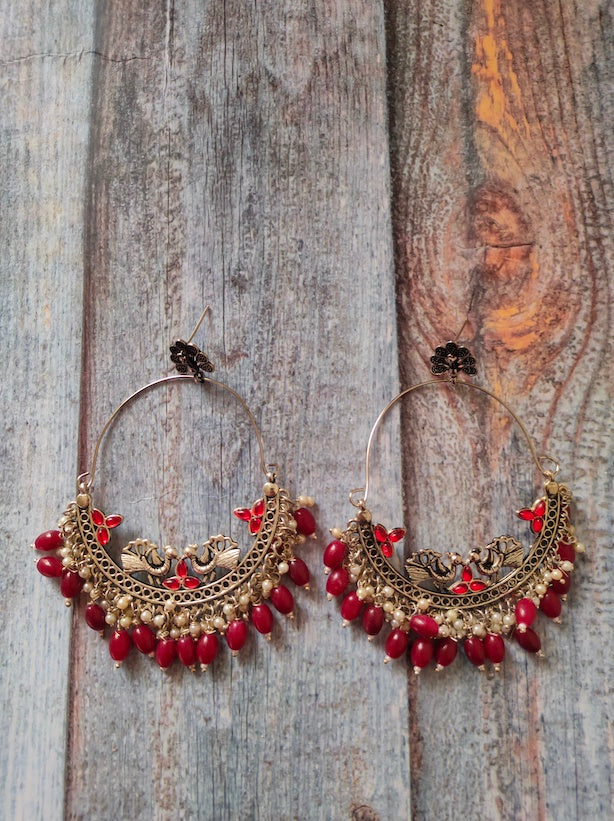 Chandbali Dangler Earrings with Peacock Motifs and Maroon Beads