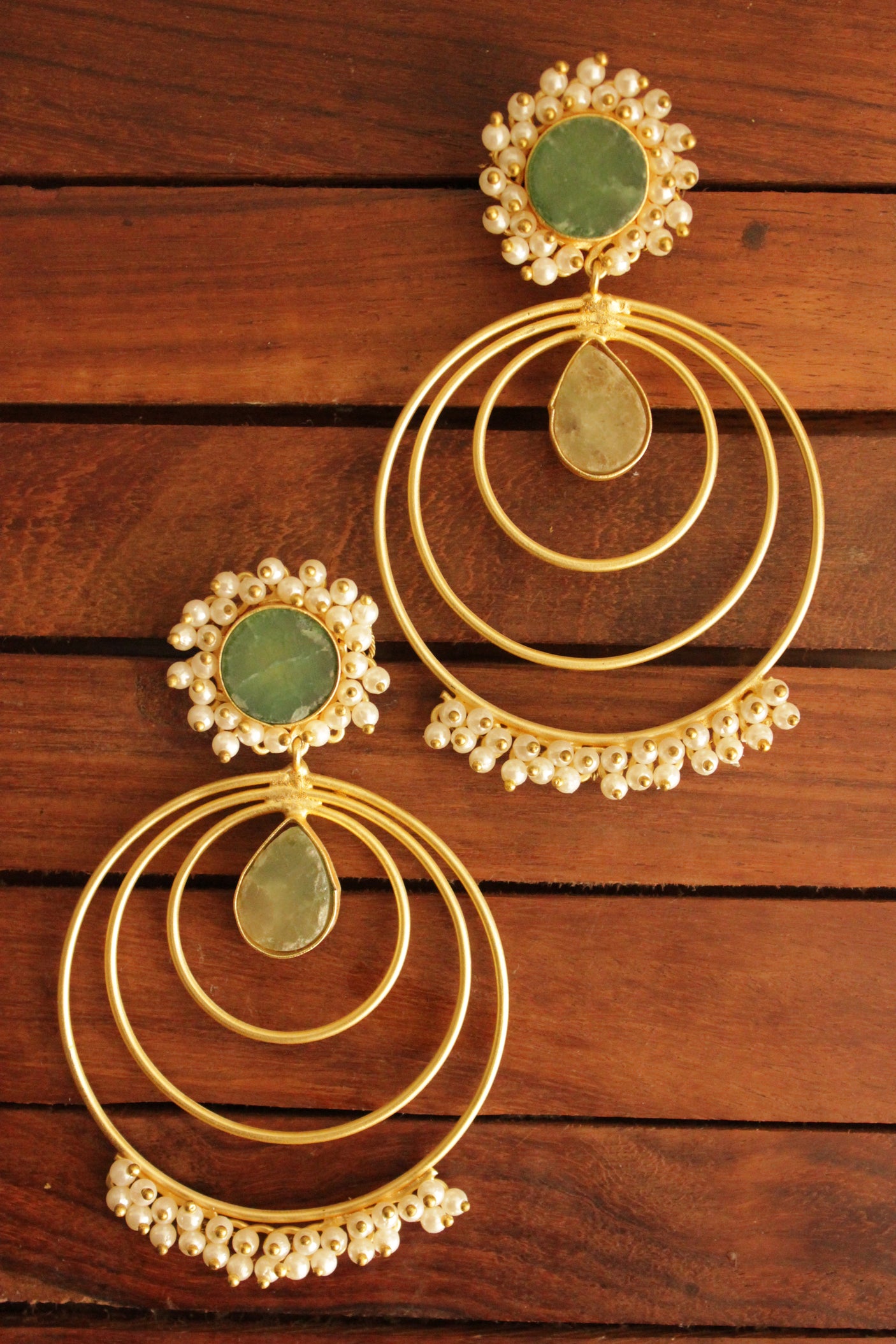 Green Raw Natural Gemstones Embedded Concentric Circles Gold Toned Handmade Brass Hoop Earrings Accentuated with White Beads