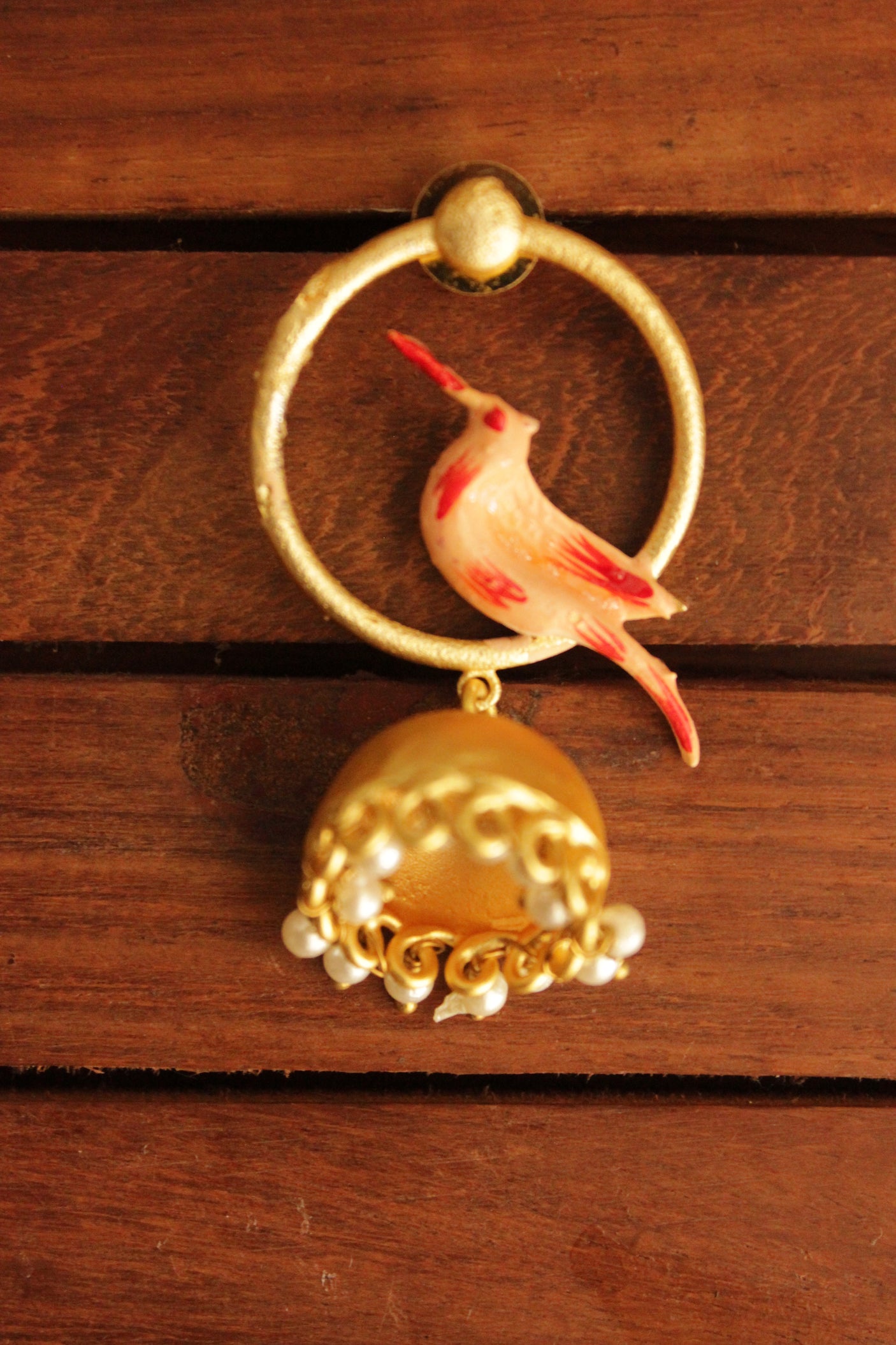 Bird Motif Hand Painted Gold Toned Handmade Brass Hoop Jhumka Earrings Accentuated with White Beads