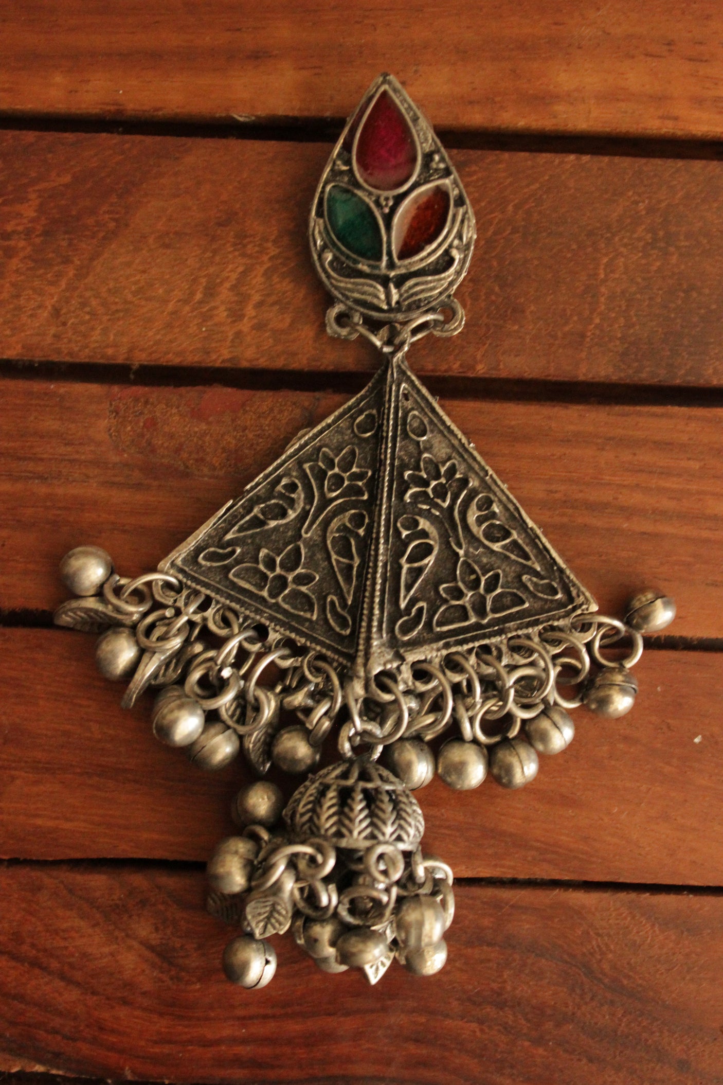 Oxidised Finish Detailed Brass Triangular Earrings with Embedded Glass Stones and Ghungroo Beads