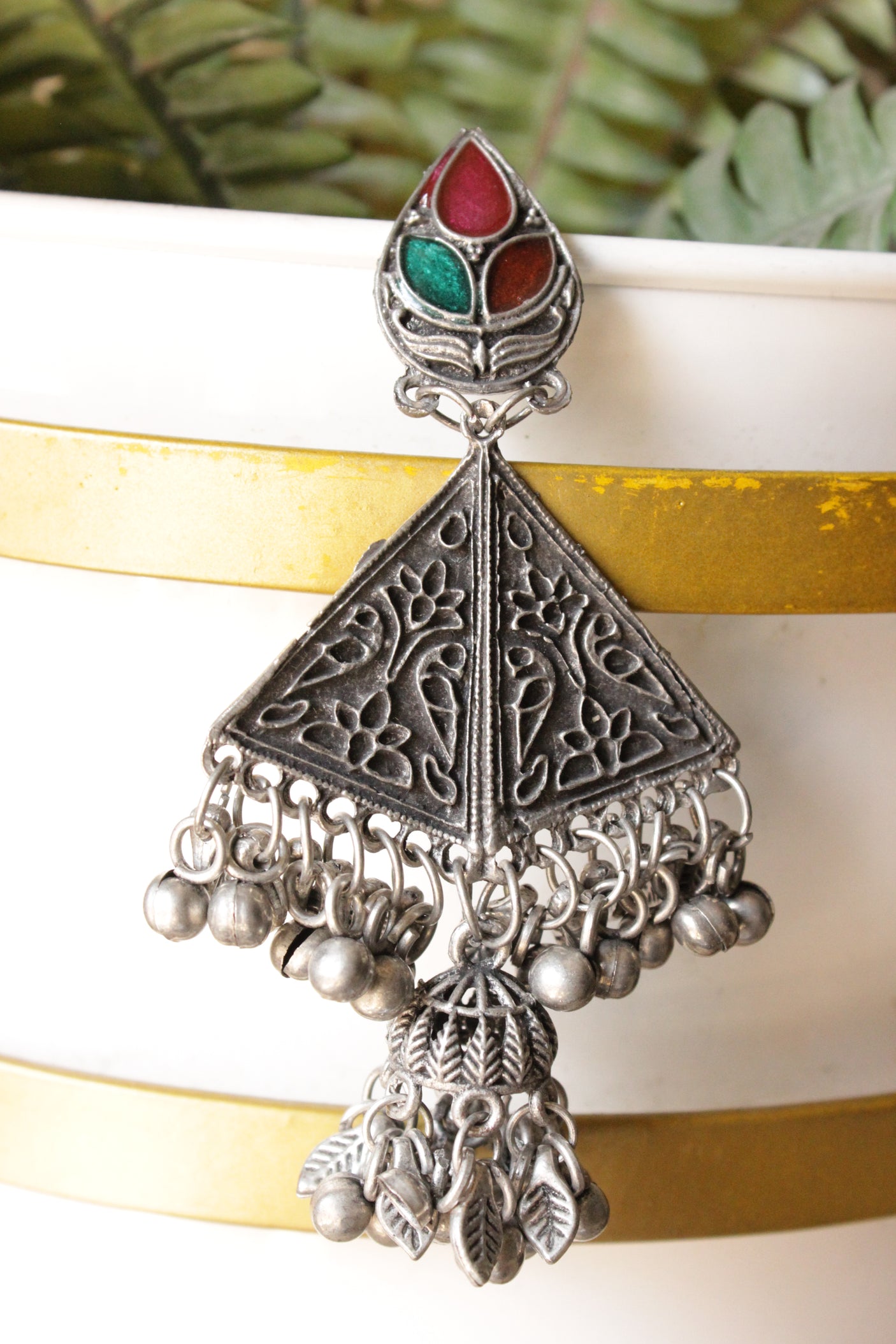 Oxidised Finish Detailed Brass Triangular Earrings with Embedded Glass Stones and Ghungroo Beads