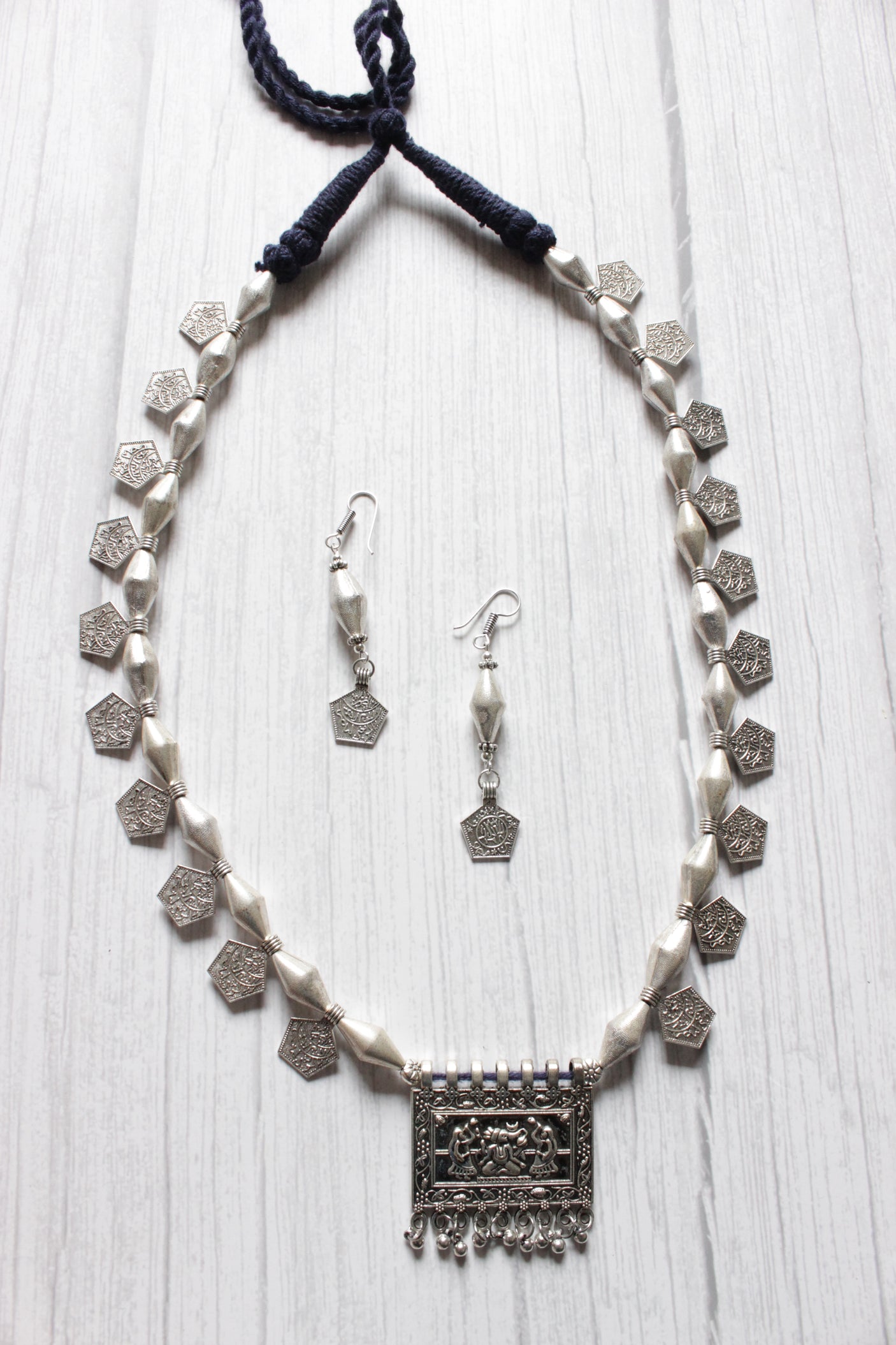 Dholki Beads and Stamped Coins Embellished Ganesha Motif Necklace Set