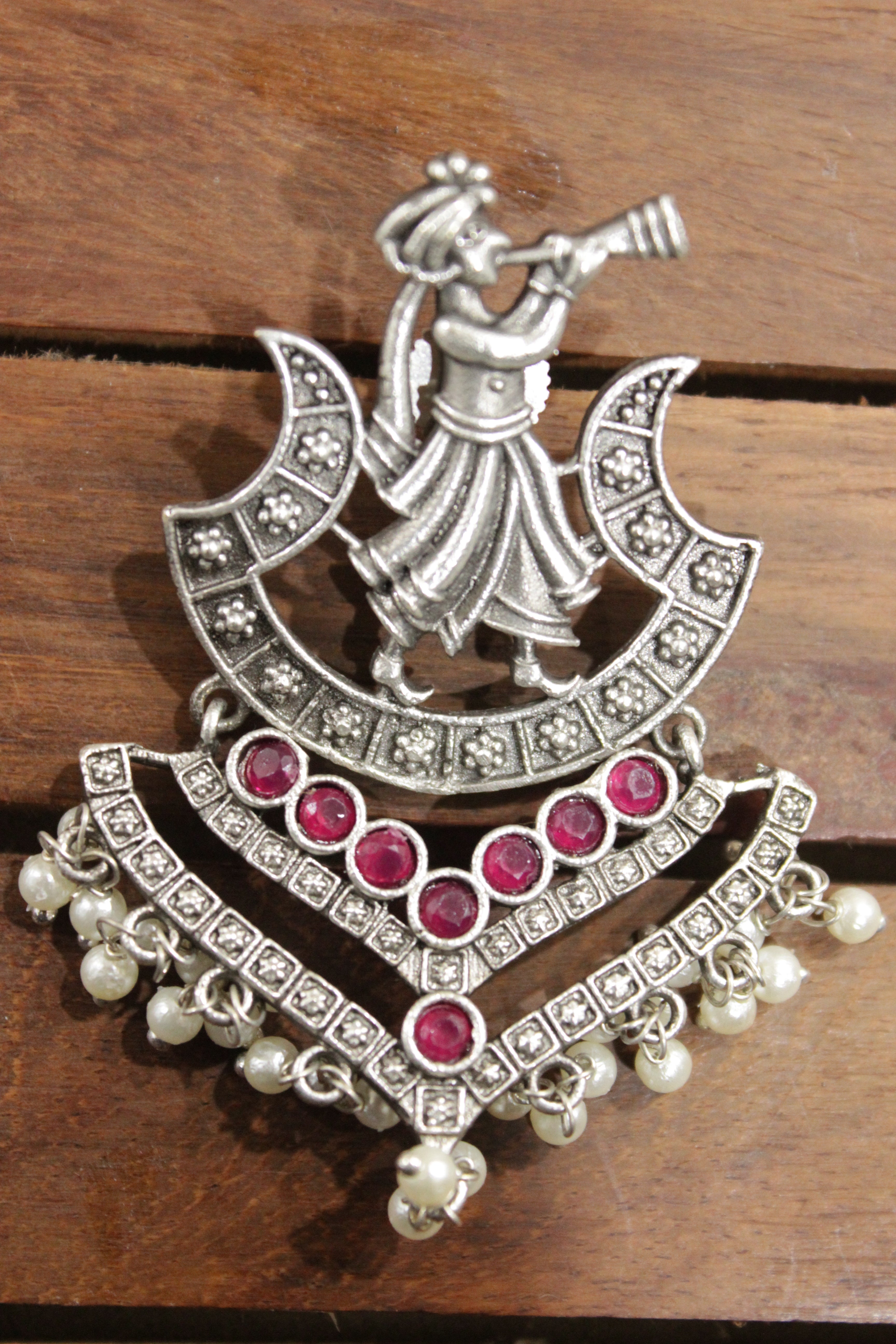 Ruby Red Glass Stones Embedded Wedding Shehnai Motif Oxidised Finish Brass Earrings