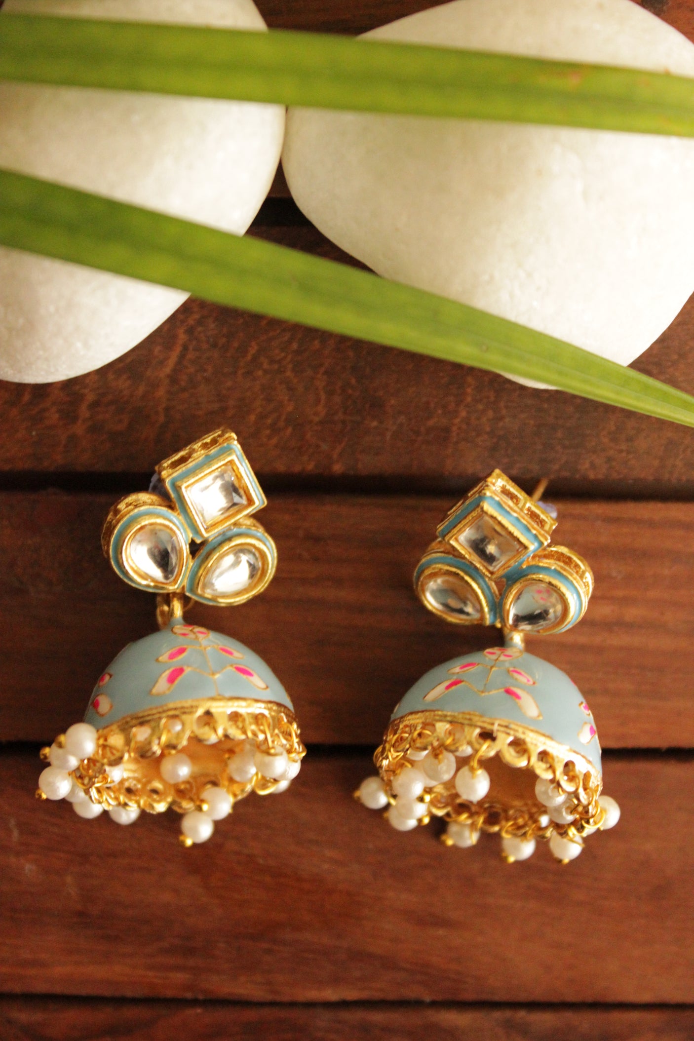 Kundan Stones Embedded Gold Toned Hand Painted Powder Grey Meenakari Jhumka Earrrings