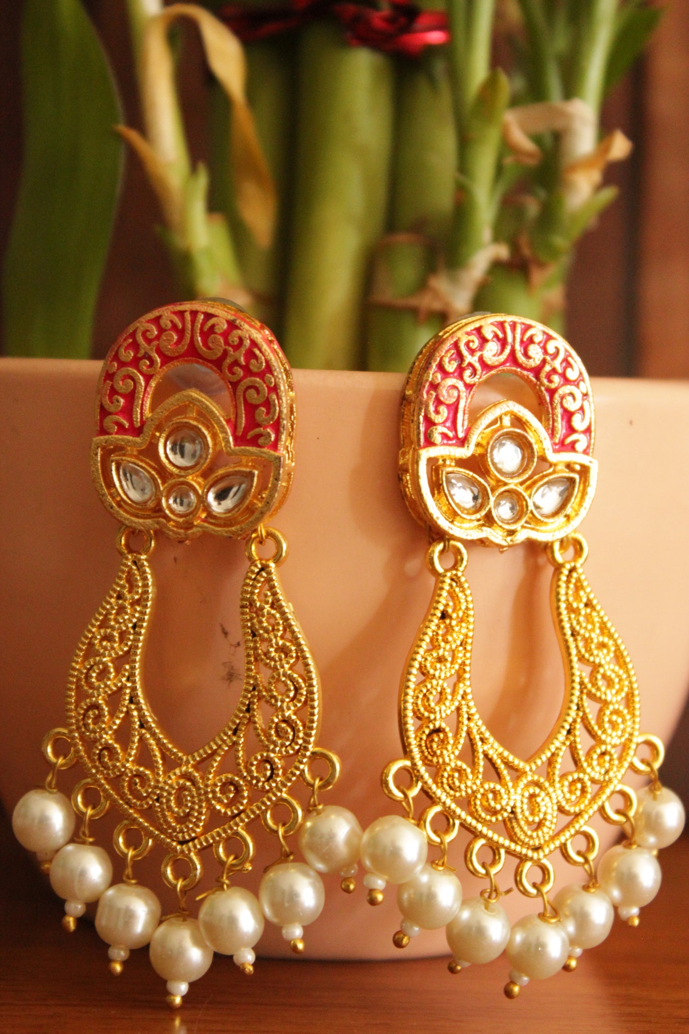 Delicate Kundan Stones Embedded Red Hand Painted Meenakari Work Gold Toned Brass Earrings