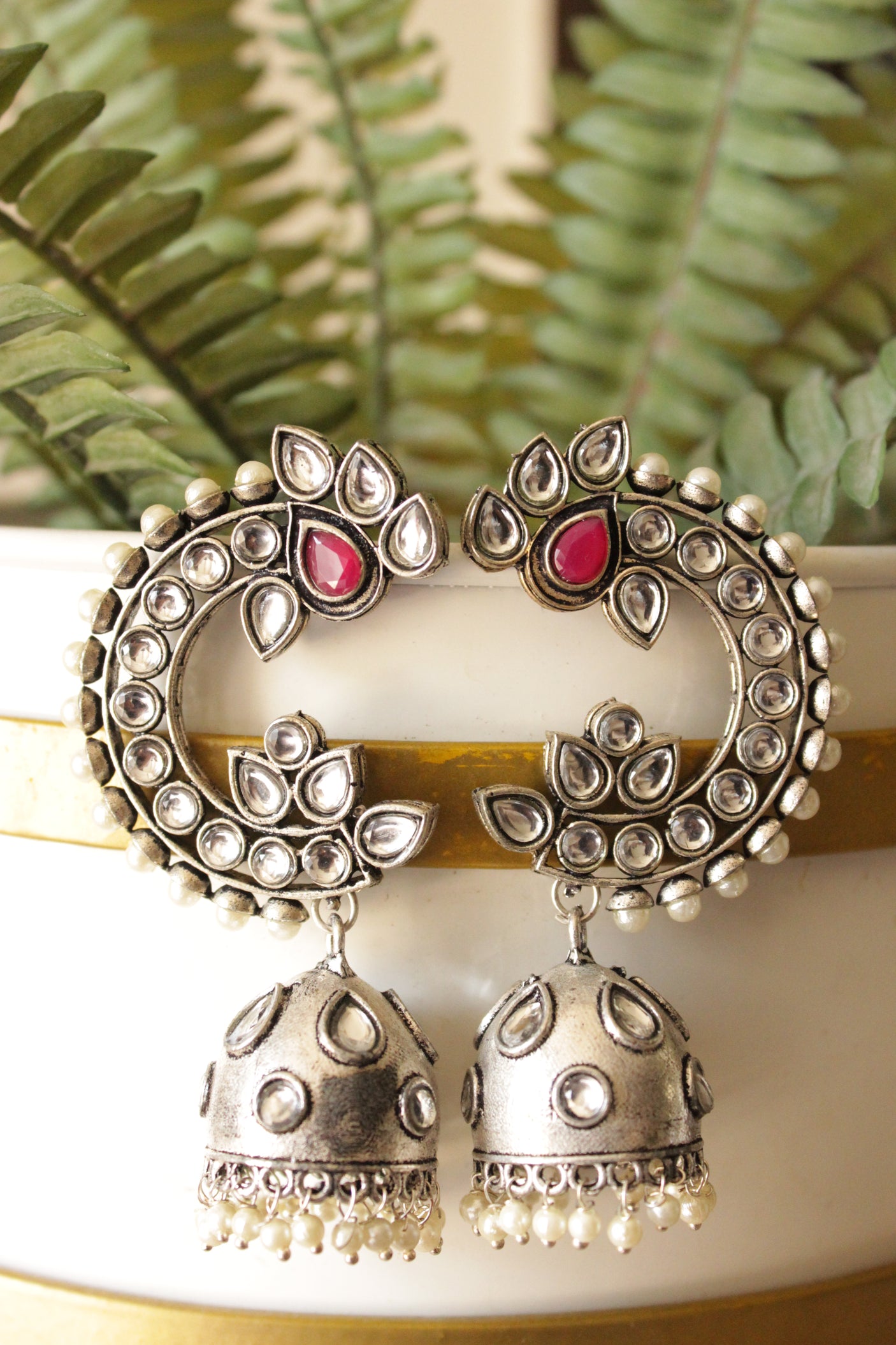 Kundan Stones Embedded Peacock Shape Premium Oxidised Finish Jhumka Earrings