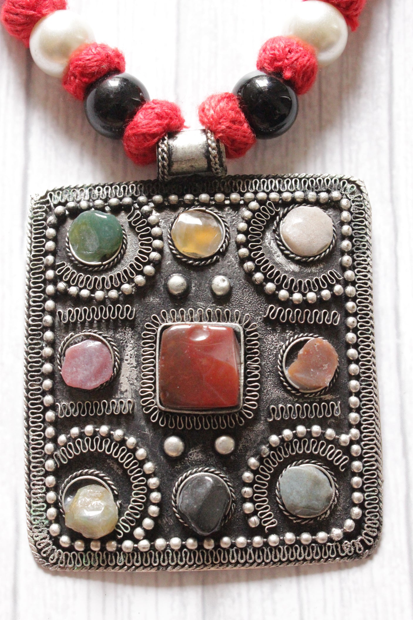 Natural Stones Embedded Oxidised Finish Afghani Pendant Braided Threads Necklace Set