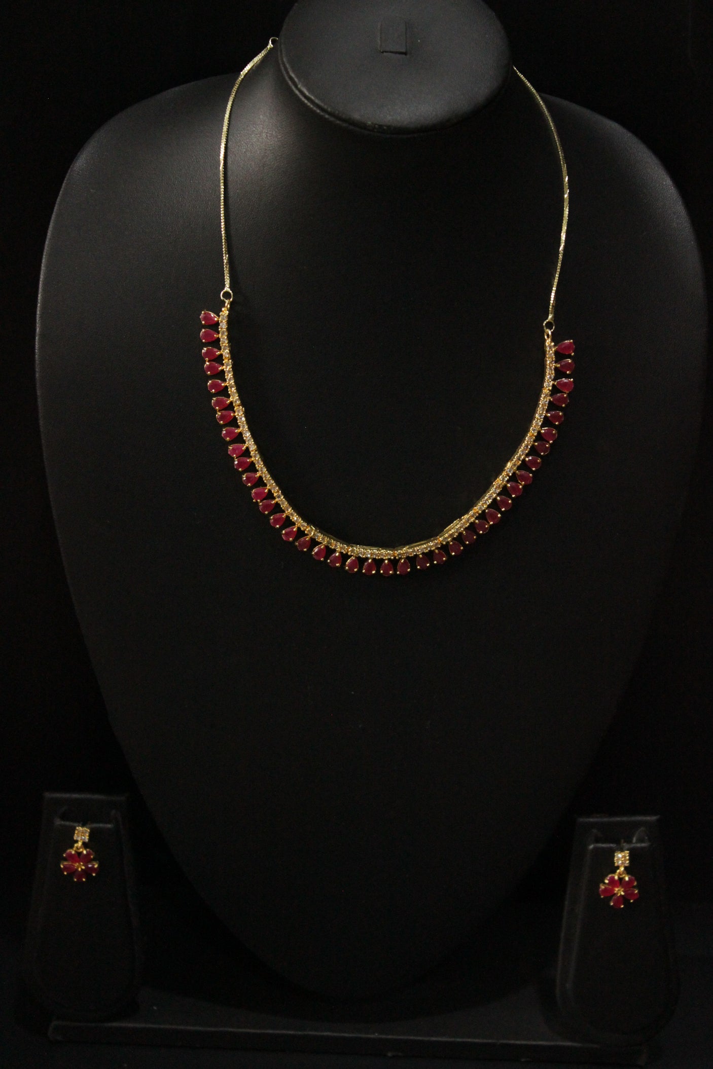 Red Ruby Stones and American Diamond Studded Delicate Gold Finish Necklace Set