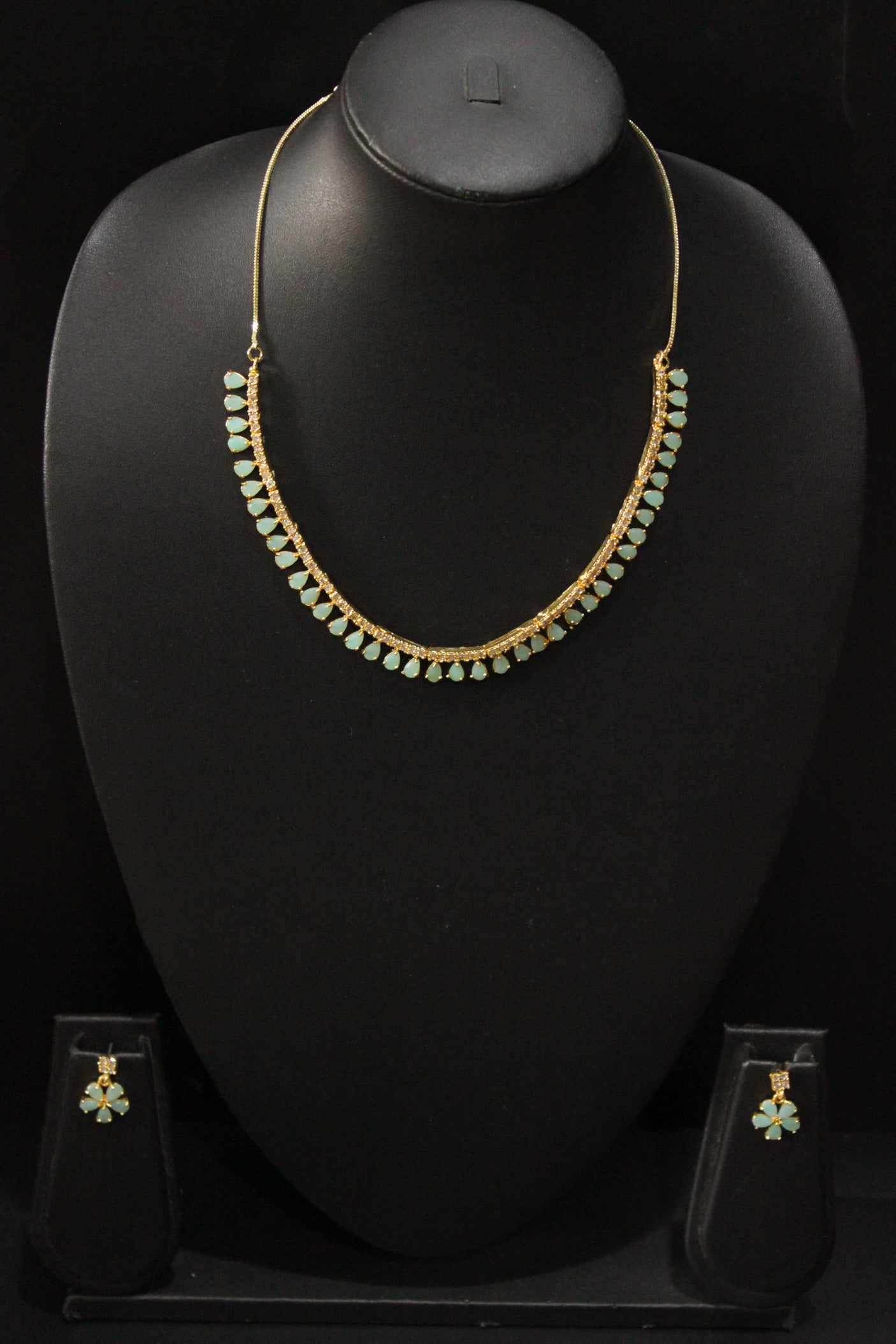 Turquoise Stones and American Diamond Studded Delicate Gold Finish Necklace Set