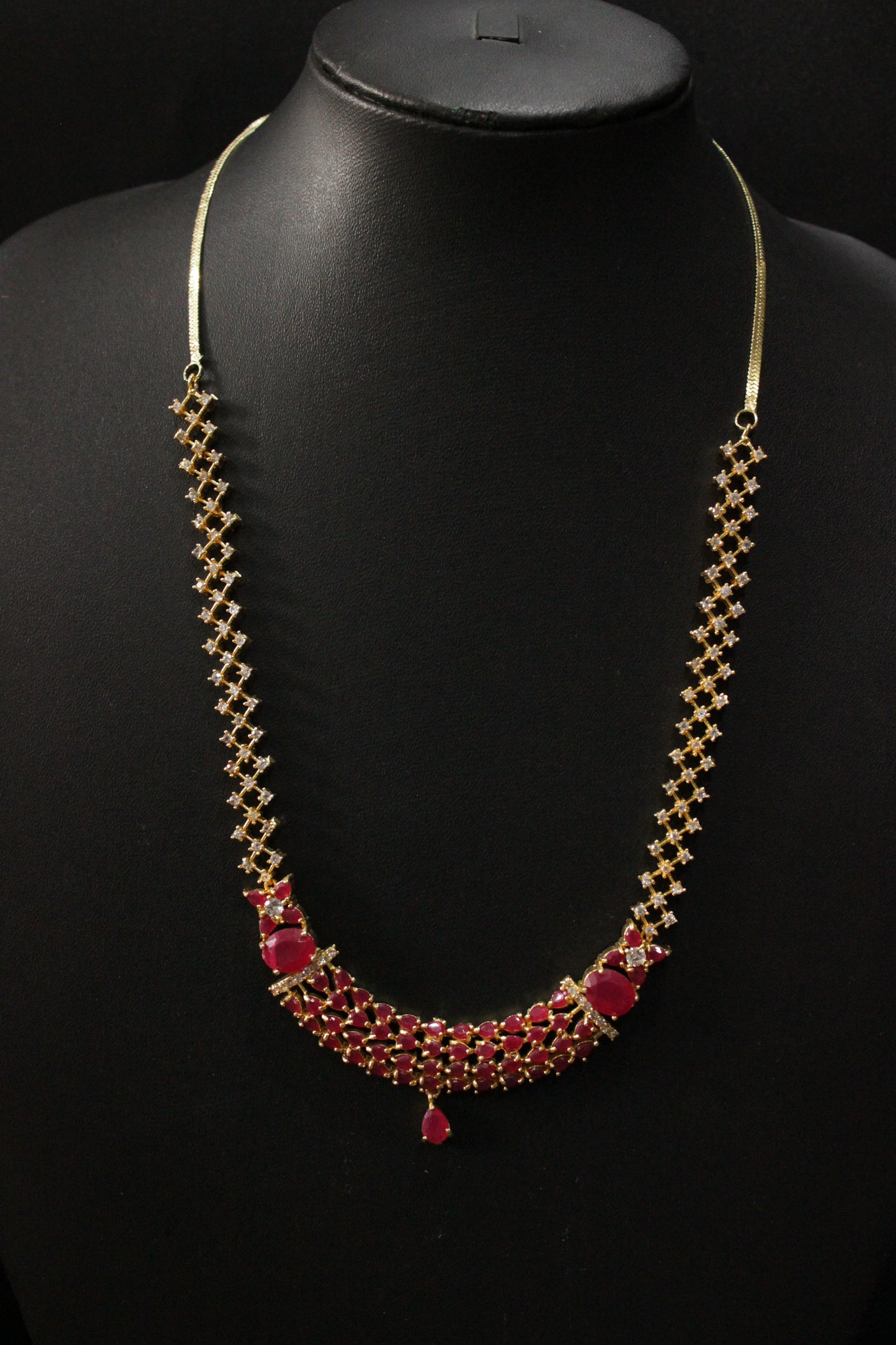 Red Ruby Stones and American Diamond Studded Delicate Gold Finish Necklace Set with Dangler Earrings