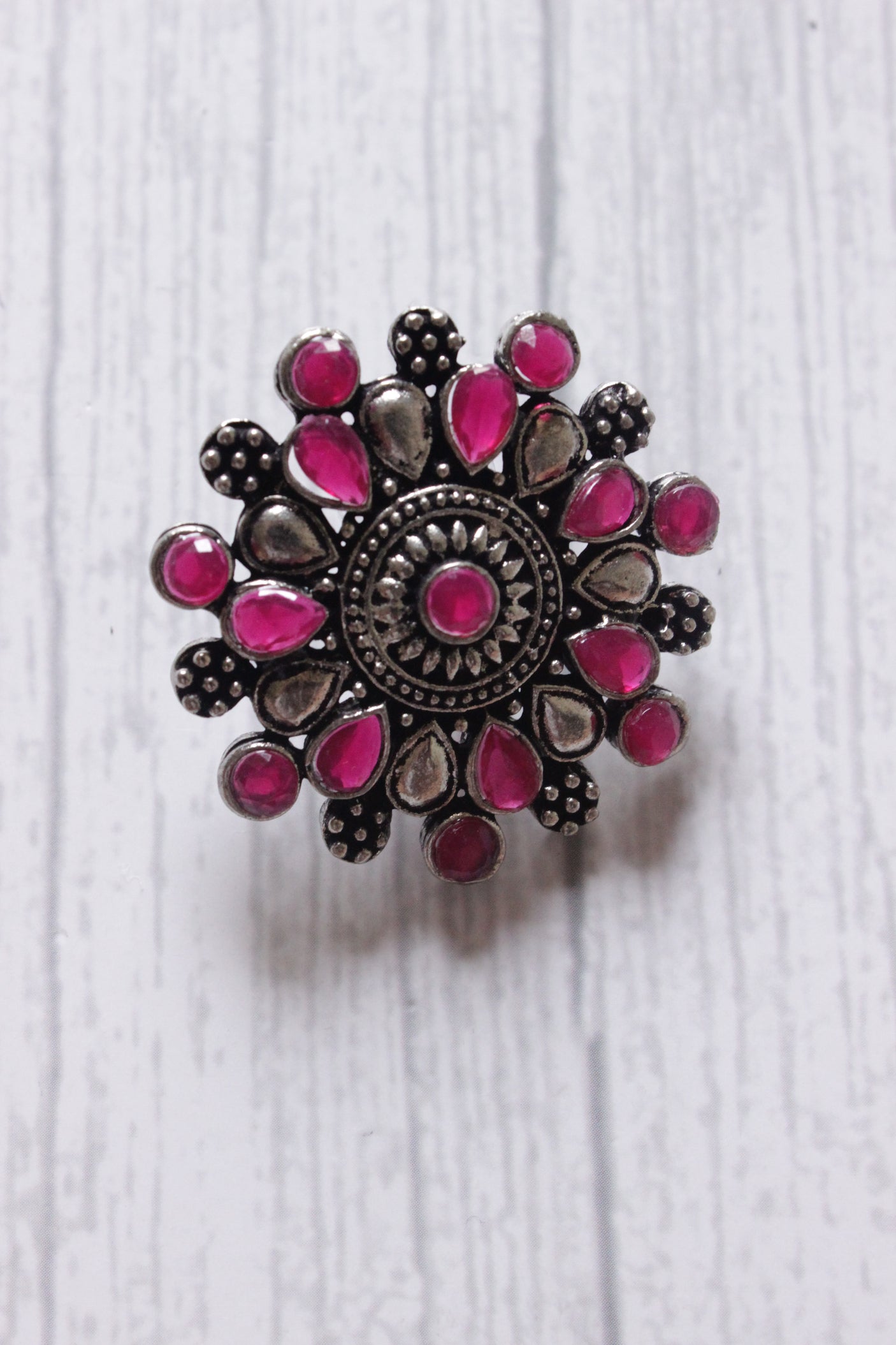 Red Stones Embedded Oxidised Silver Finish Statement Stud Earrings