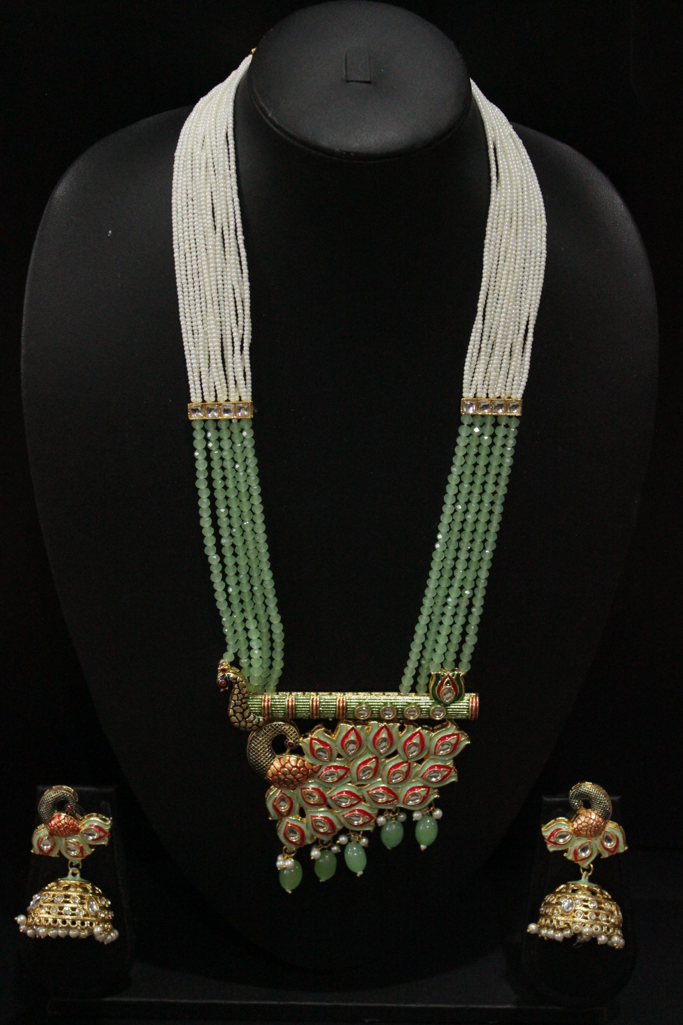 Kundan Stones Embedded Enamel Painted Peacock and Bansuri Motif Pendant Multi-Layer Turquoise Beads Necklace Set
