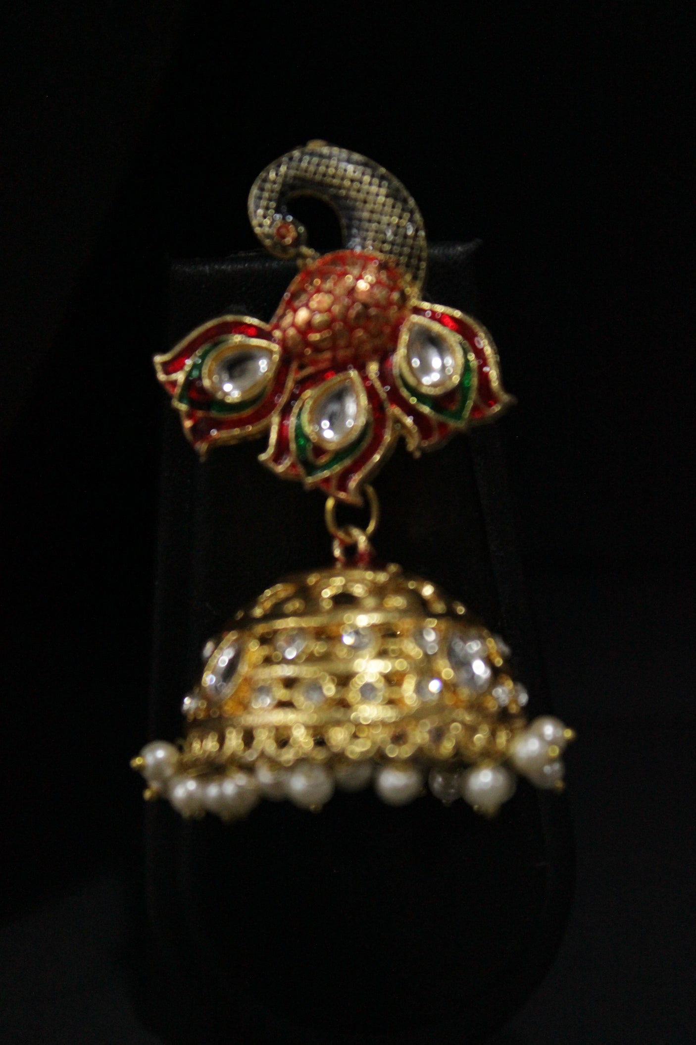 Kundan Stones Embedded Enamel Painted Peacock and Bansuri Motif Pendant Multi-Layer Red Beads Necklace Set