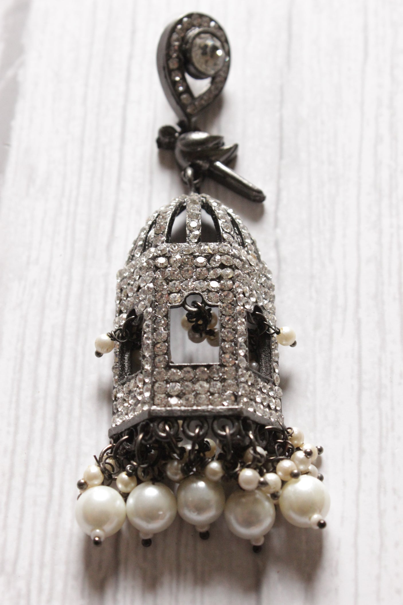 American Diamond Studded Mahal Shape Jhumka Earrings Embellished with White Beads