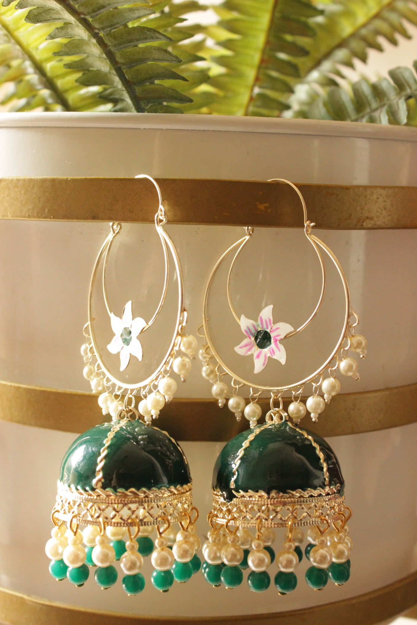 Bottle Green Hand Painted Meenakari Work Gold Toned Hoop Jhumka Earrings Accentuated with Beads