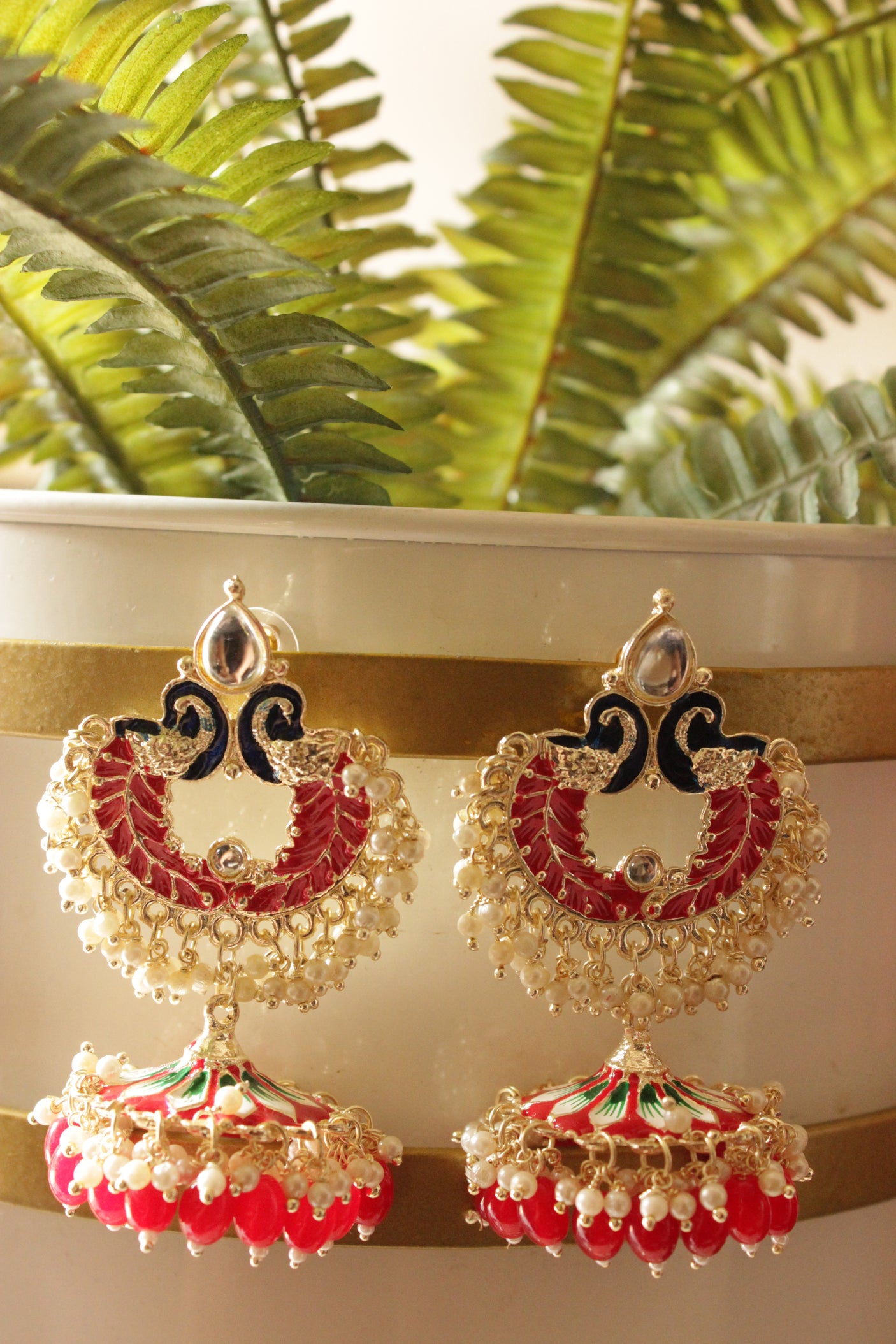 Vibrant Red Hand Painted Meenakari Work Statement Jhumka Earrings Accentuated with White and Red Beads