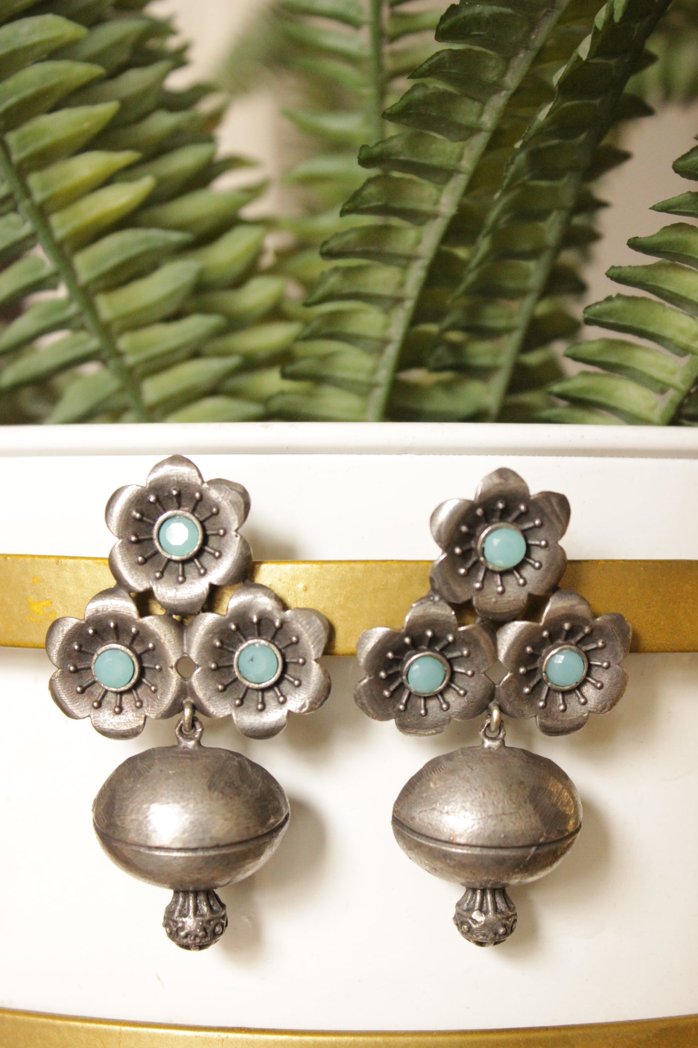 Turquoise Glass Stones Embedded Premium Oxidised Finish Flower and Bud Shaped Dangler Earrings