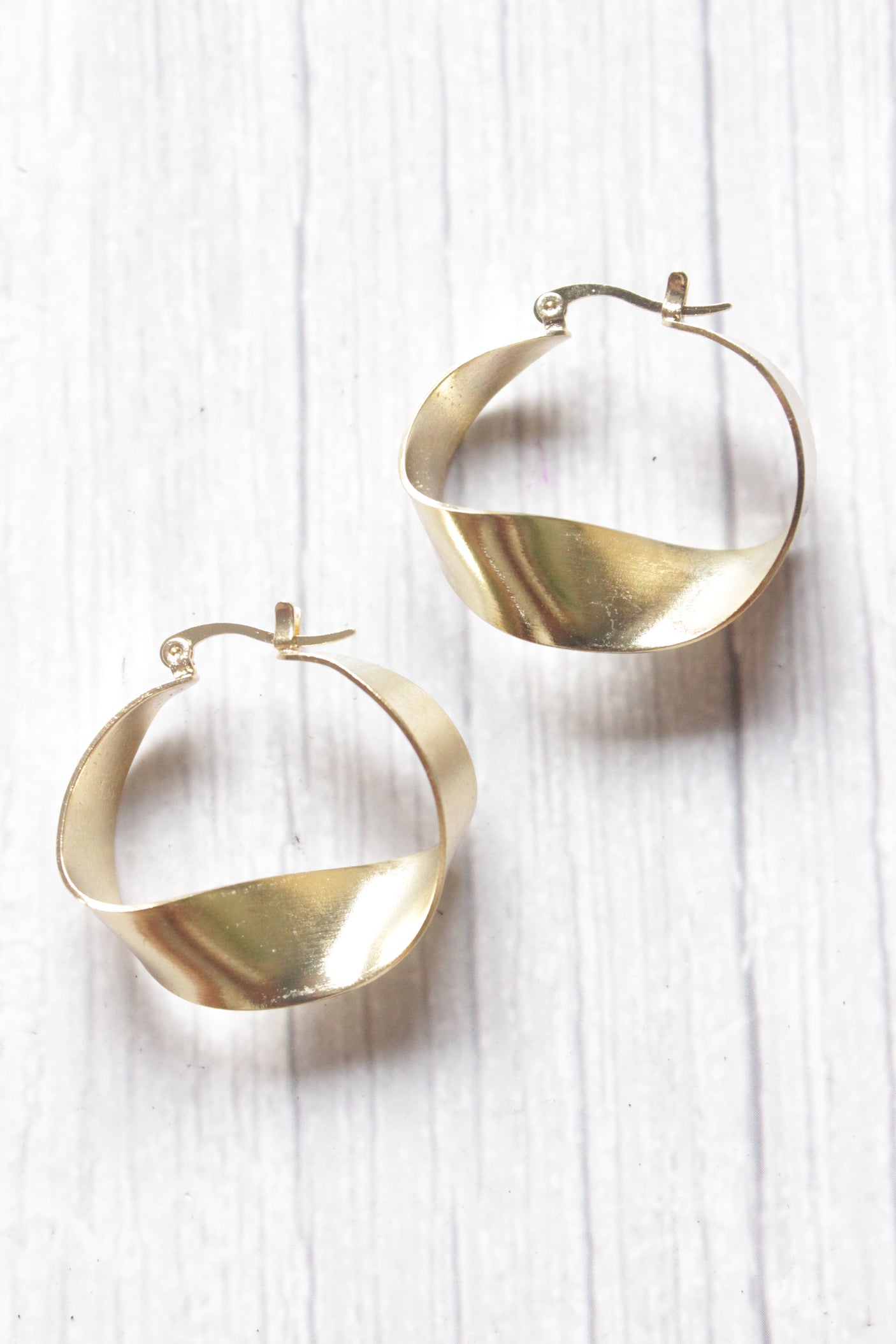 Twisted Metal Bright Gold Finish Hoop Earrings