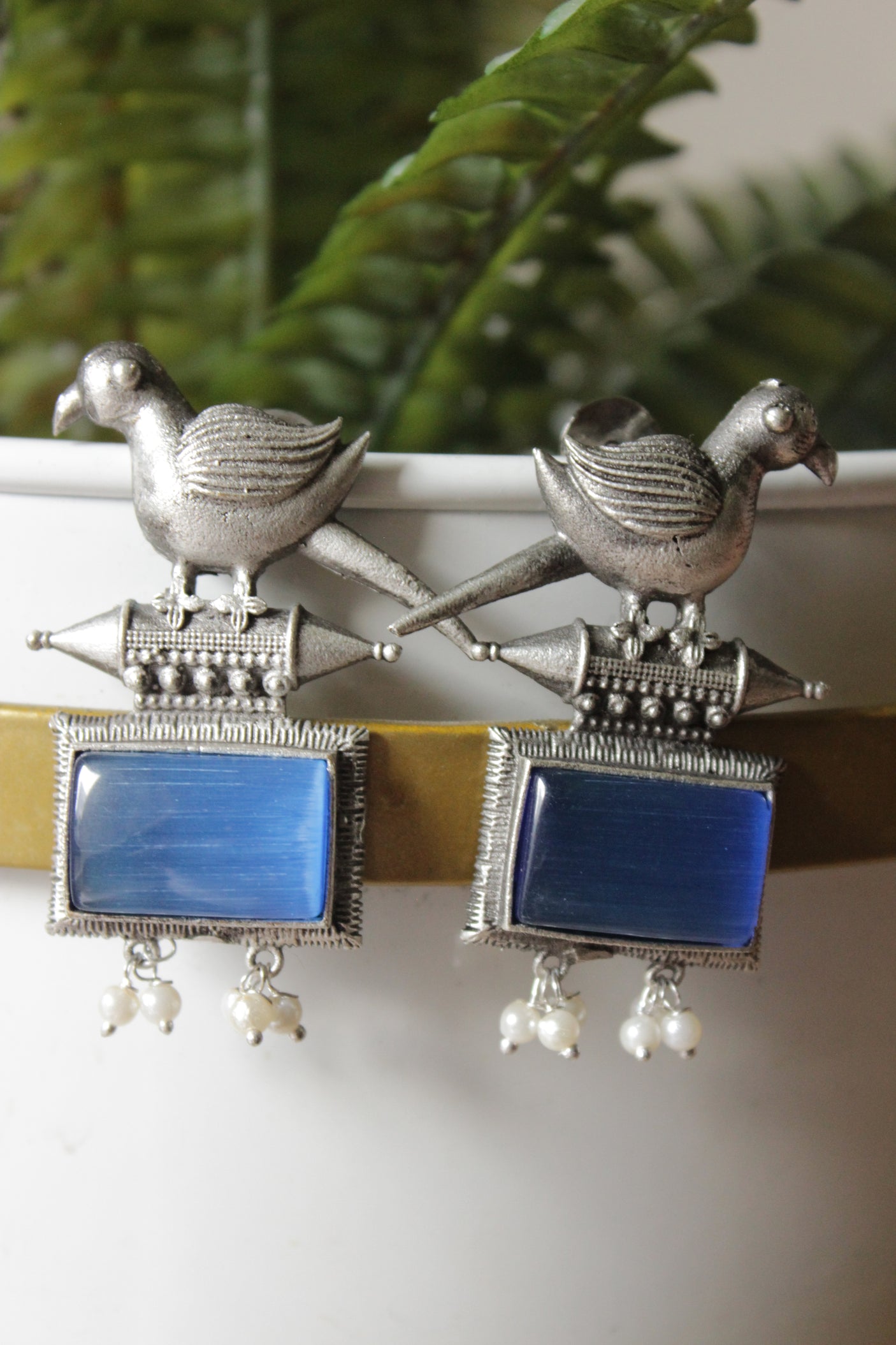 Peacock Motif Royal Blue Glass Stone Embedded Silver Finish Brass Dangler Earrings