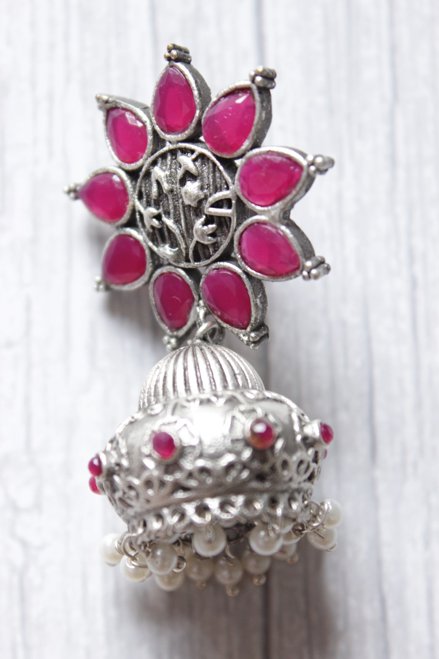 Bridal Plum Glass Stones Embedded Silver Finish Flower Motif Dangler Jhumka Earrings in Brass