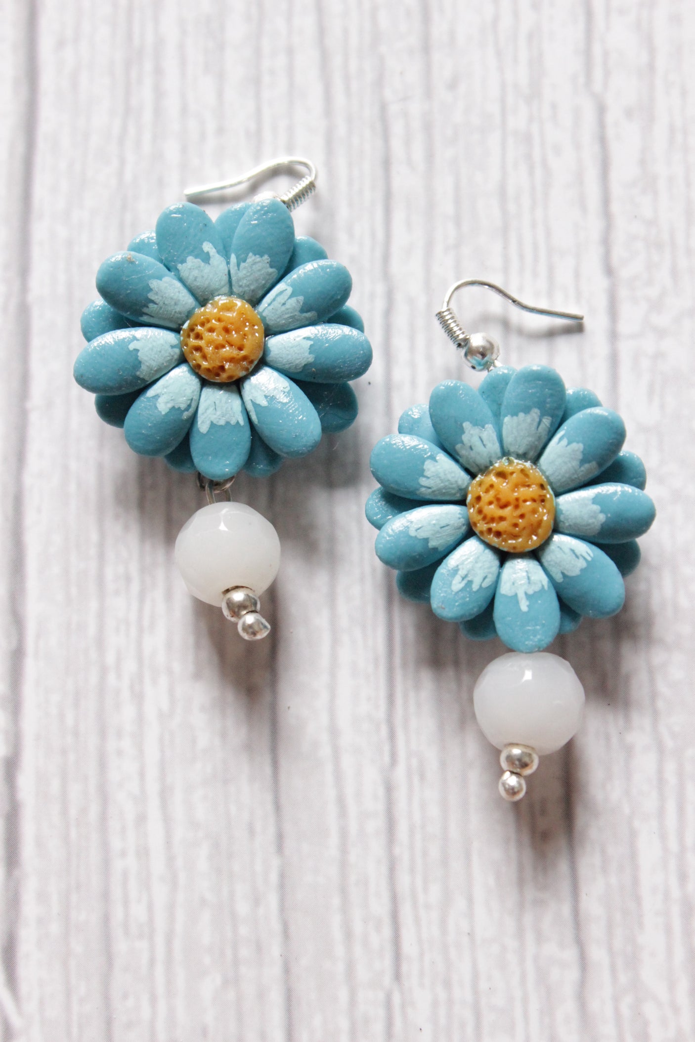 Shades of Blue Handcrafted Clay Flower Jewelry with White Beaded Strings Closure