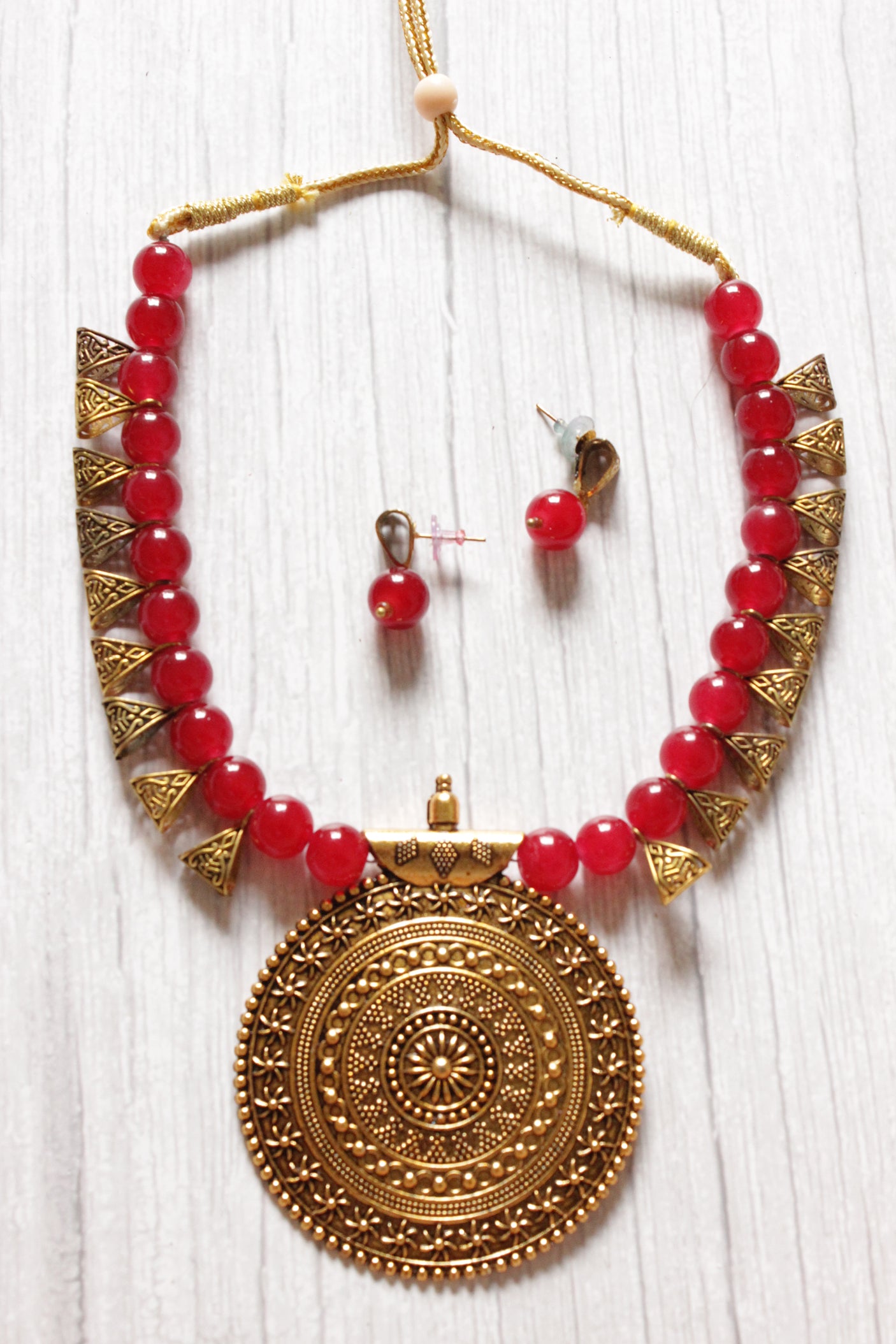 Gold-Toned Red Glass Beads Necklace Set with Statement Pendant