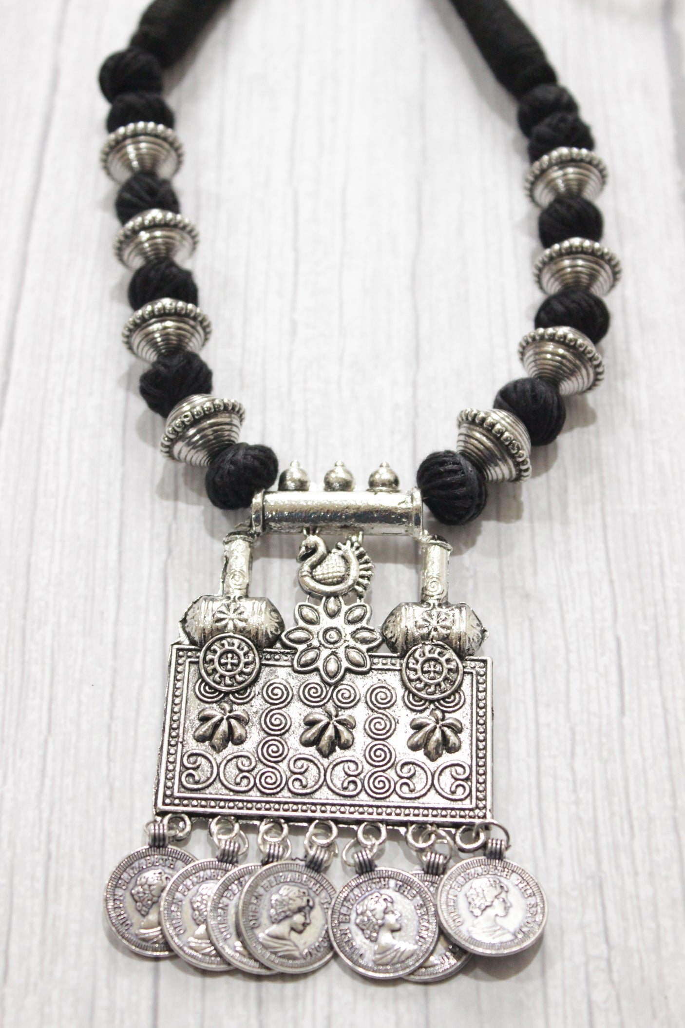 Intricately Detailed Statement Pendant Necklace with Stamped Coins and Thread Closure