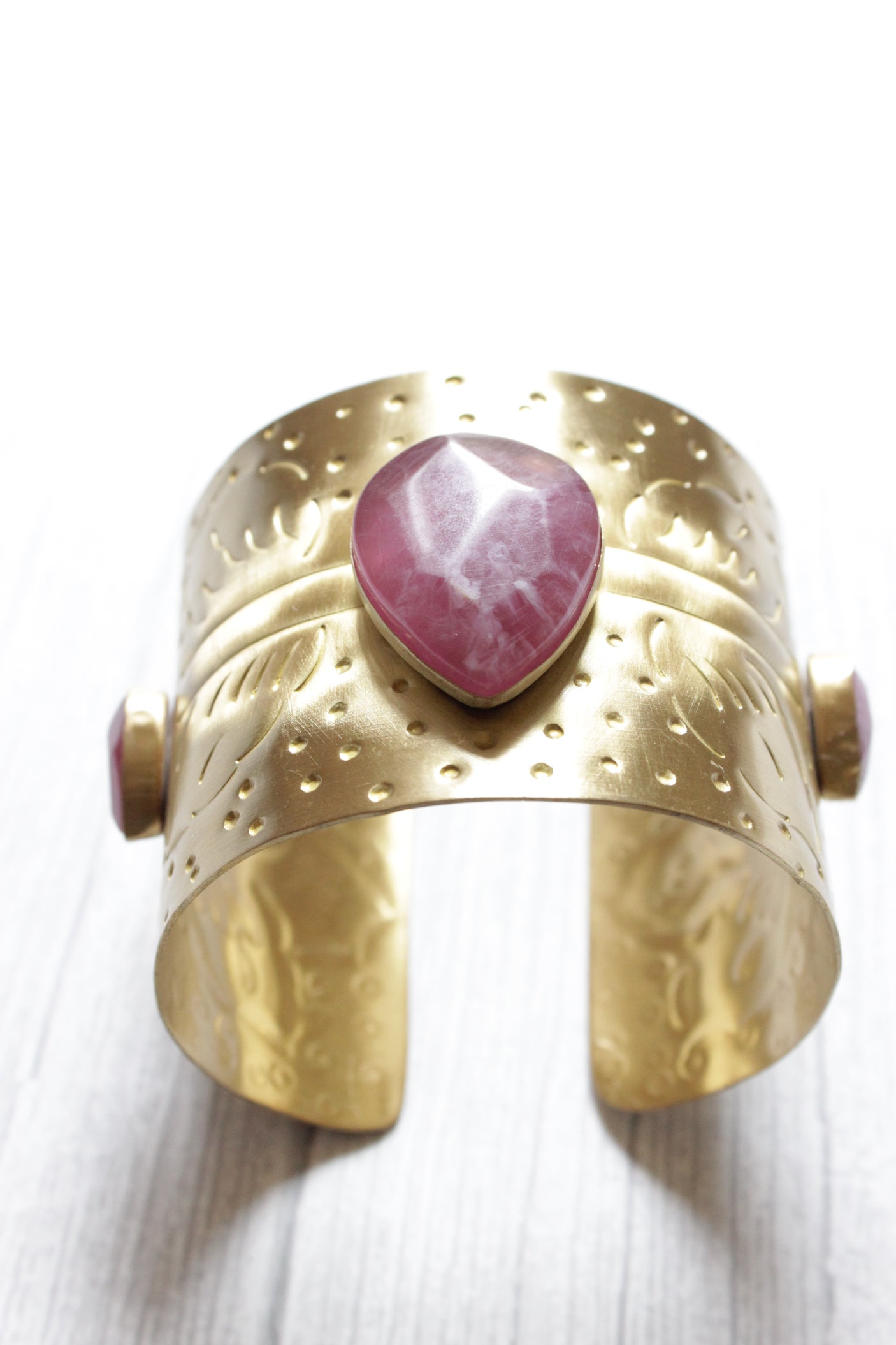 Statement Ruby Centerpiece Embedded Gold Finish Bracelet