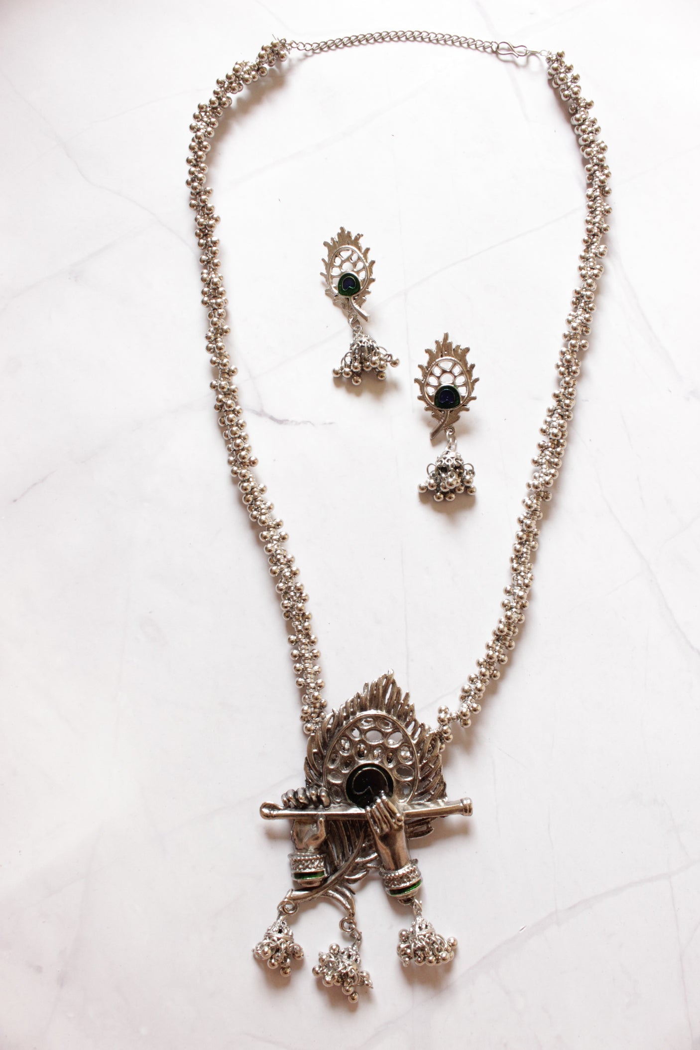 Peacock Feather and Bansuri Motif Statement Pendant Silver Finish Necklace Set