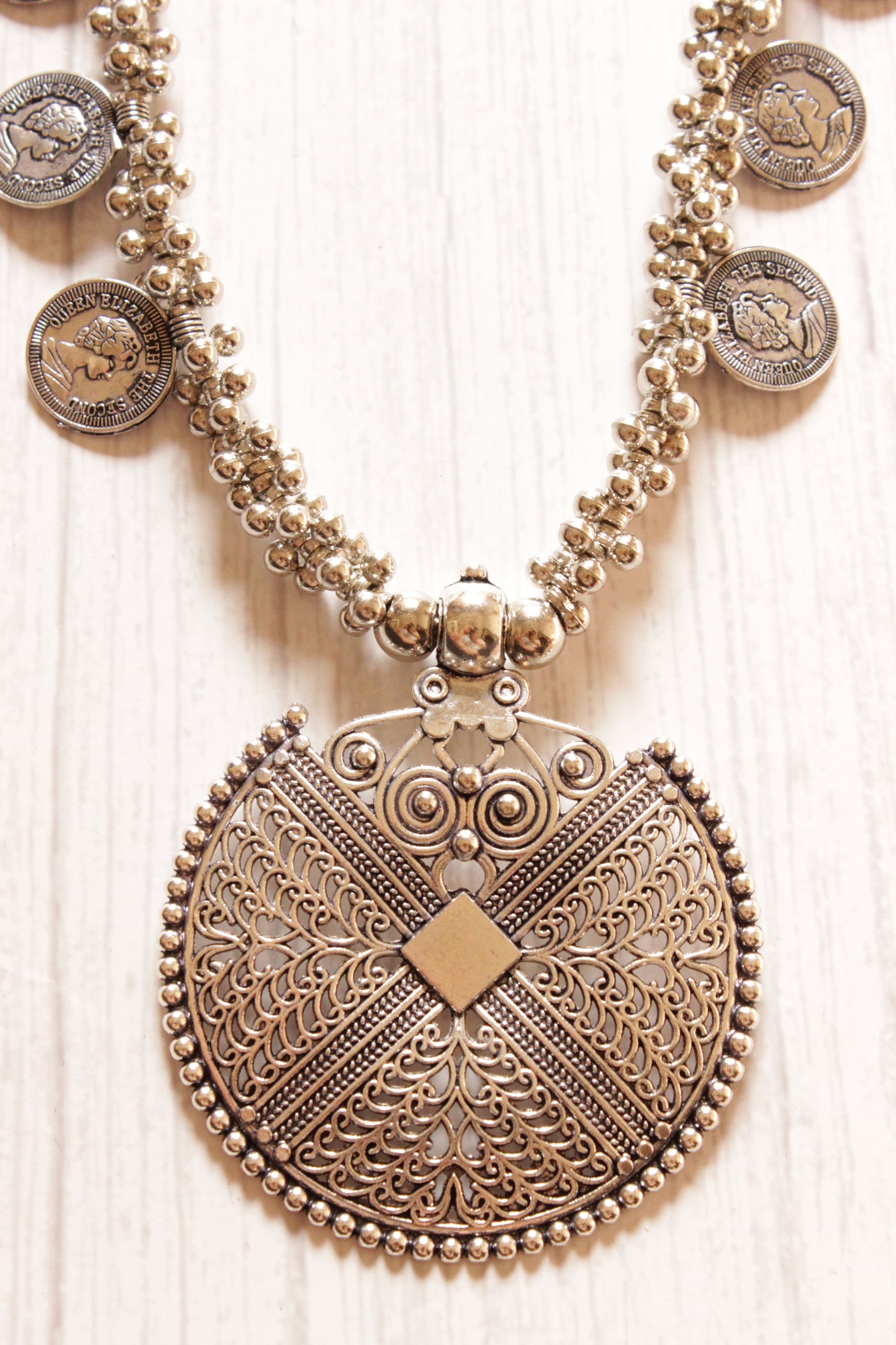 Metal Stamped Coins and Ghungroo Beads Embellished Silver Finish Long Necklace