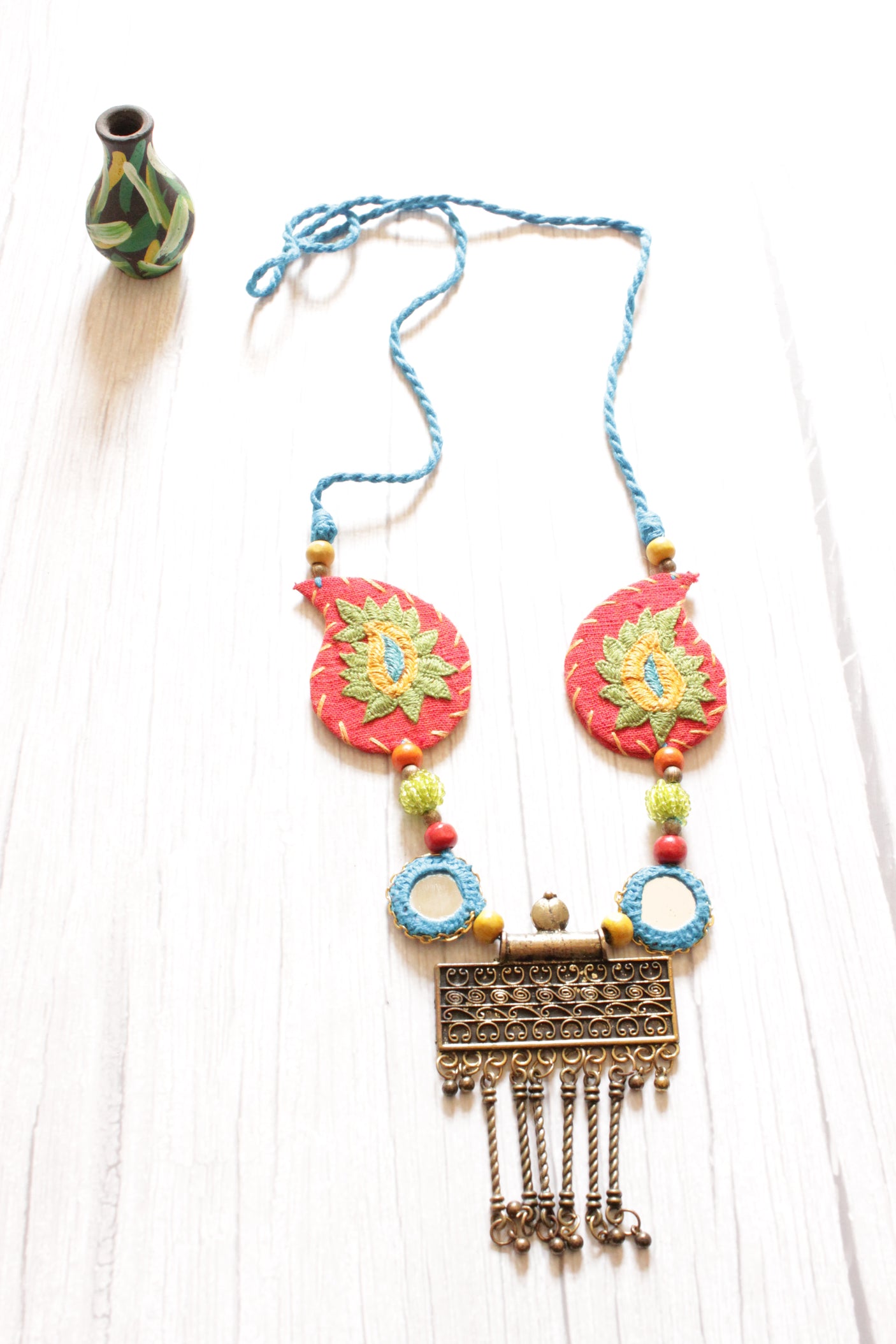 Handcrafted Thread Work Fabric Necklace with A Statement Metal Pendant