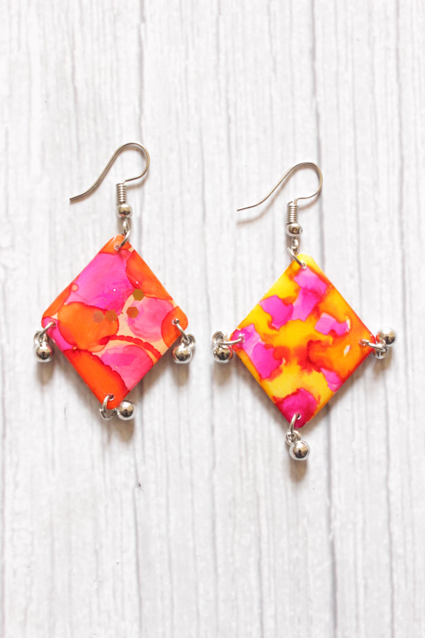 Pink and Orange Hand Painted Resin Earrings with Metal Ghungroo Beads Accents