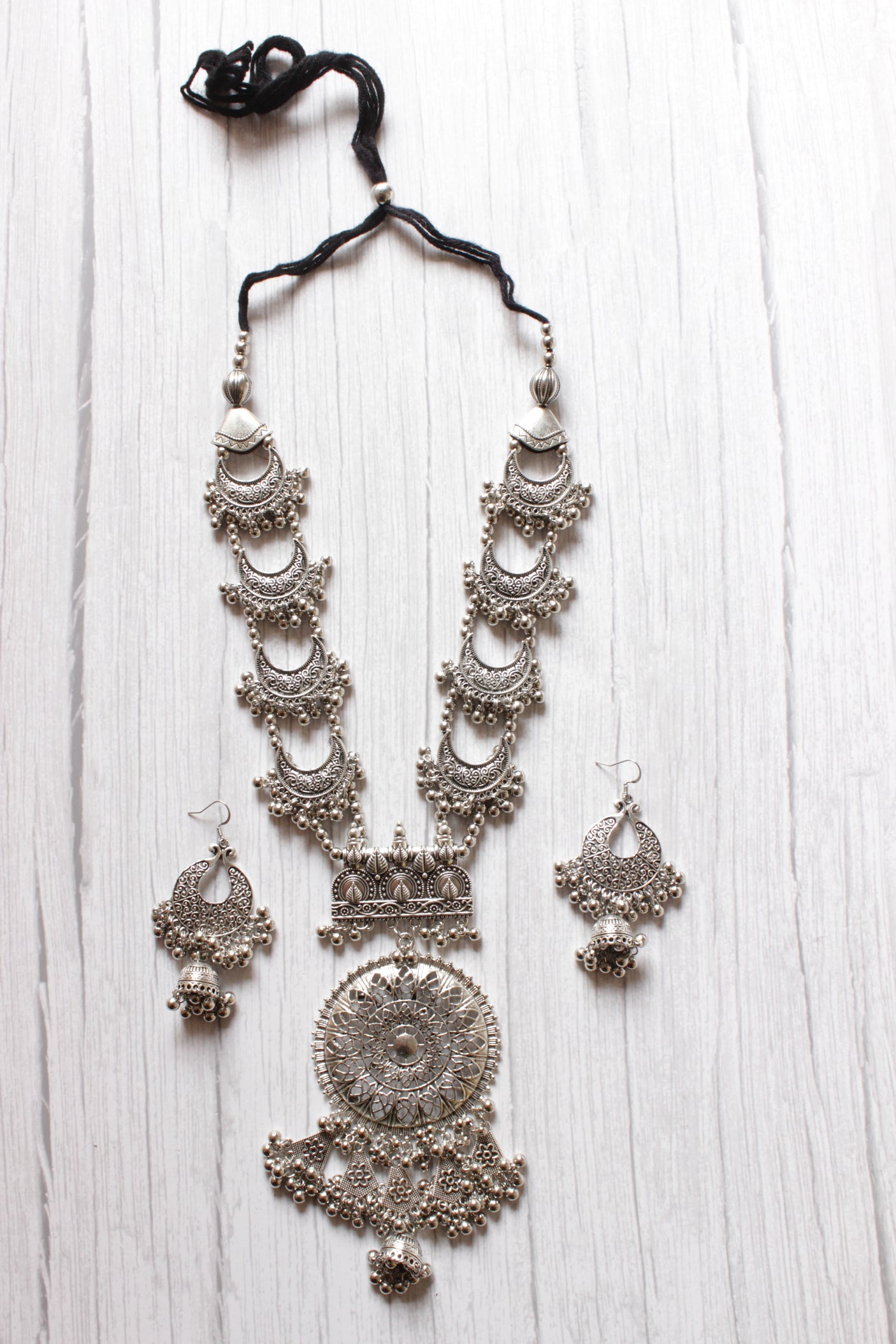 Long Silver Finish Metal Necklace Set with Intricate Detailing